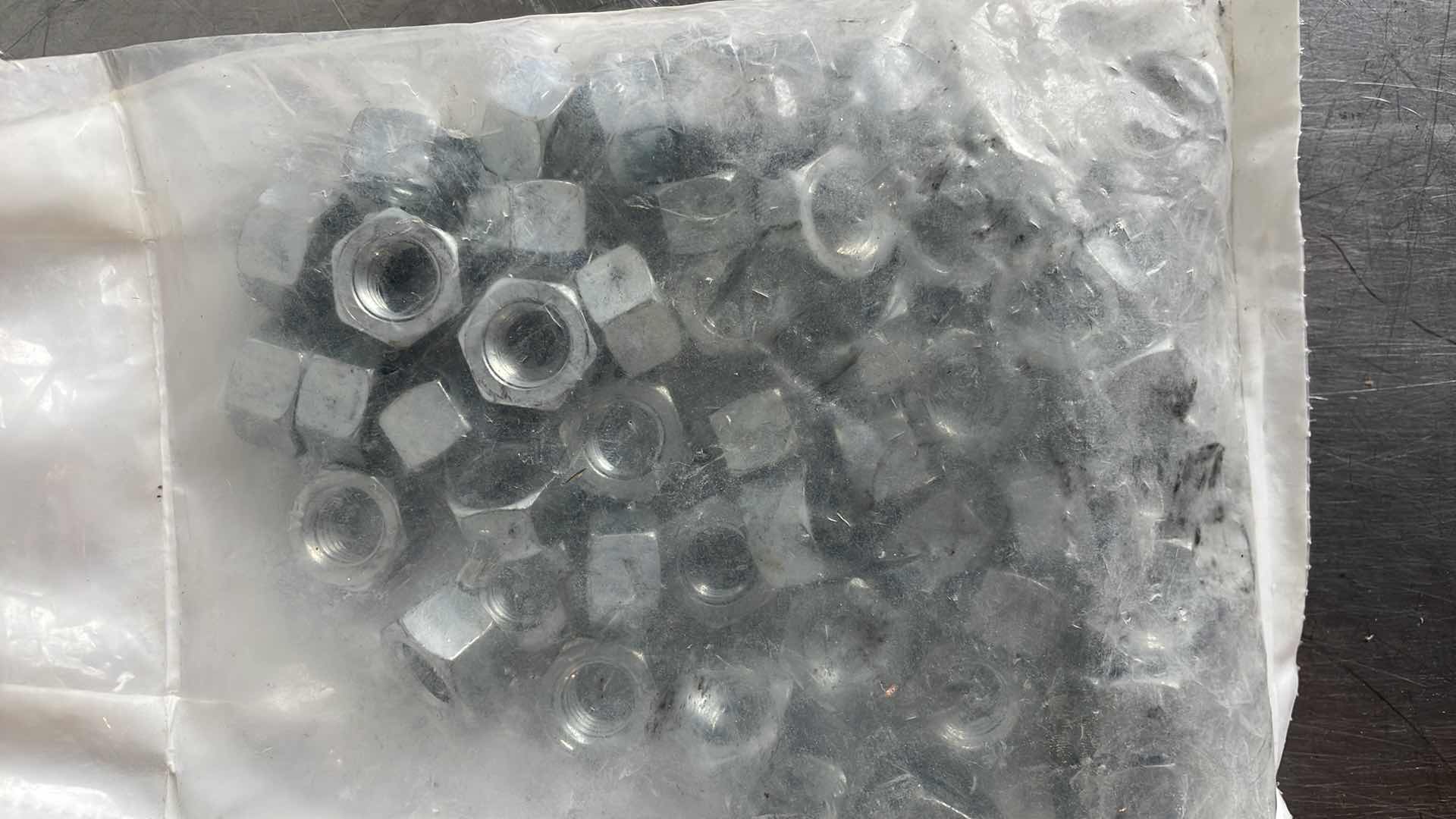 Photo 1 of 1/2-13 GRADE 5 HEX NUTS (100)