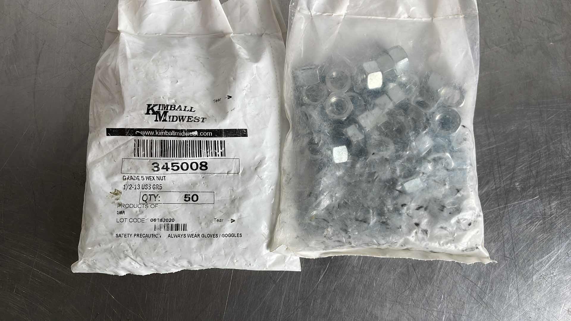 Photo 1 of 1/2-13 GRADE 5 HEX NUTS (100)