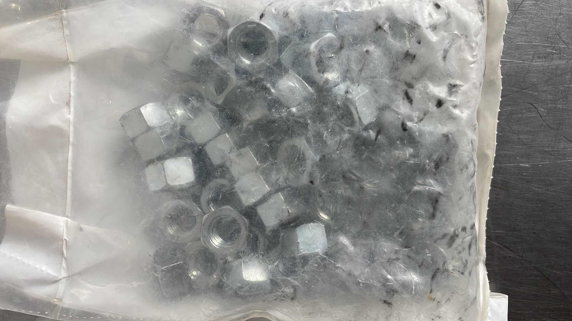 Photo 1 of 1/2-13 GRADE 5 HEX NUTS (100)