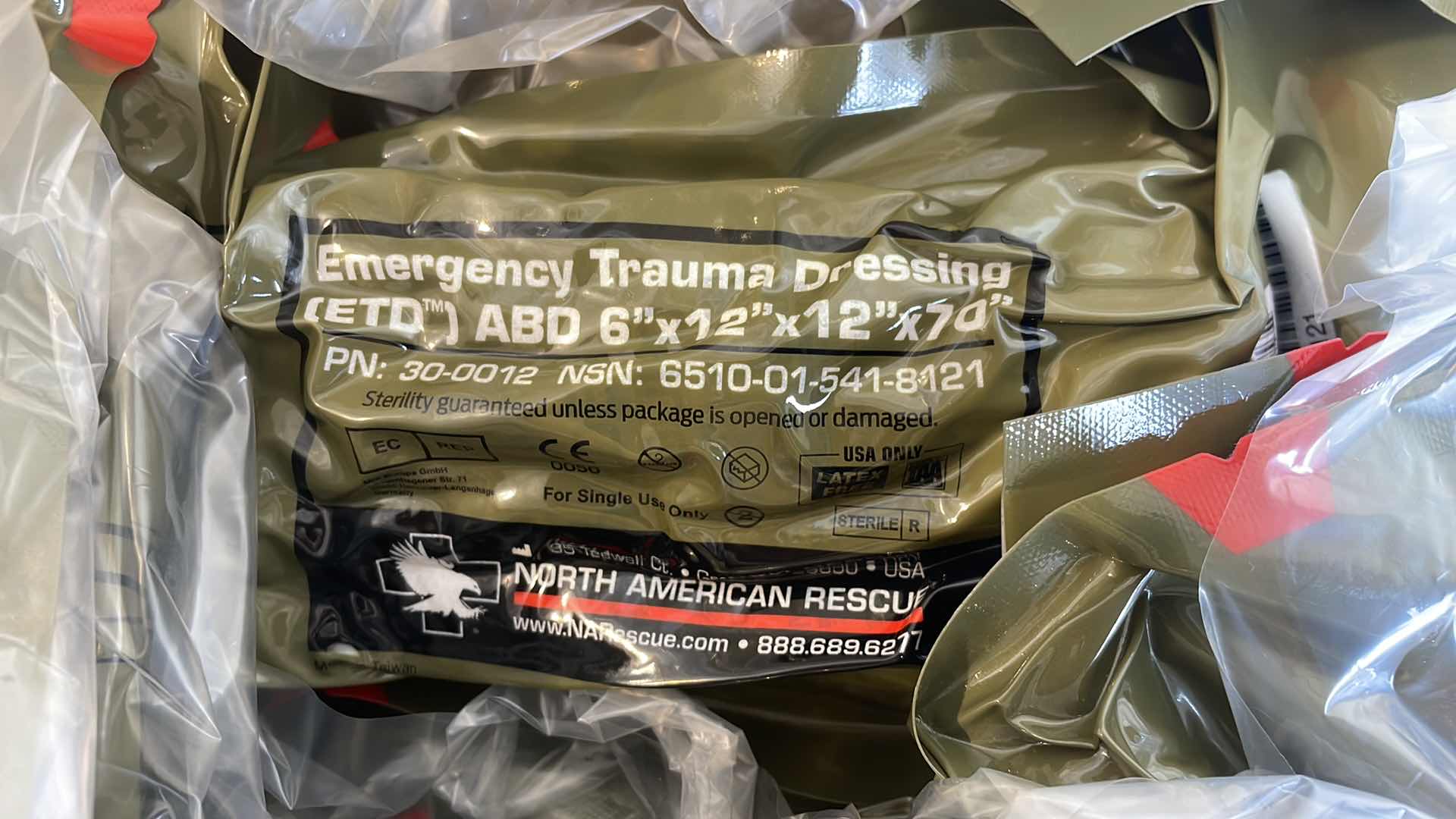 Photo 1 of EMERGENCY TRAUMA DRESSING 6” X 12” X 70” (25) EXP 6/23