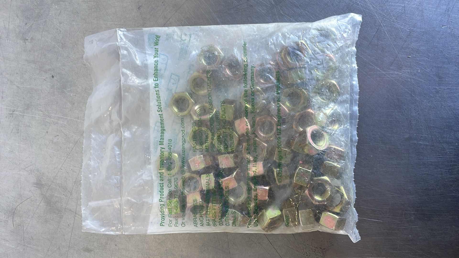 Photo 1 of 7/16-14 HEX NUTS GR 8 (50)