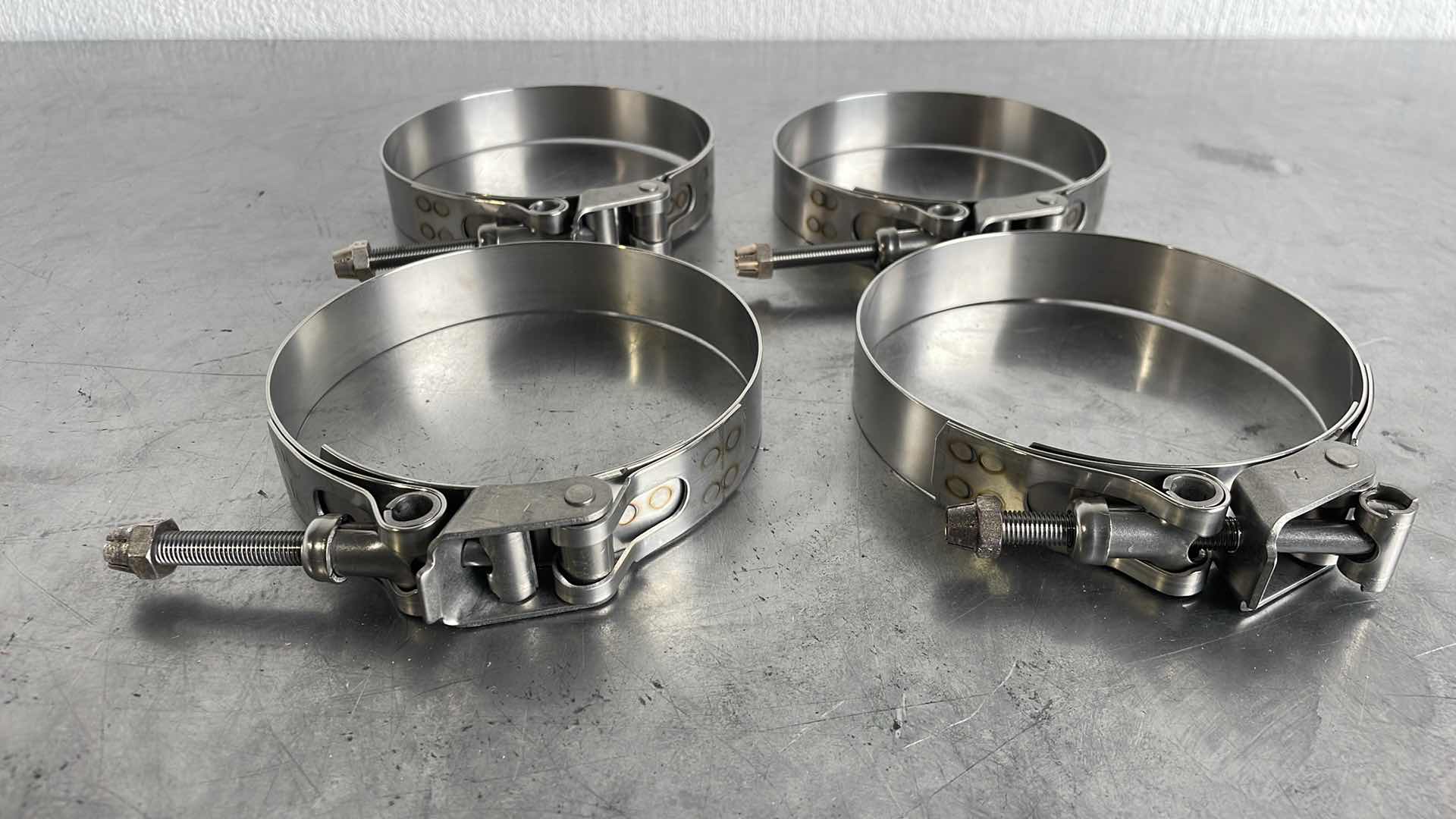 Photo 1 of PIPE HOSE CLAMPS 5” - 5-1/2” (4)