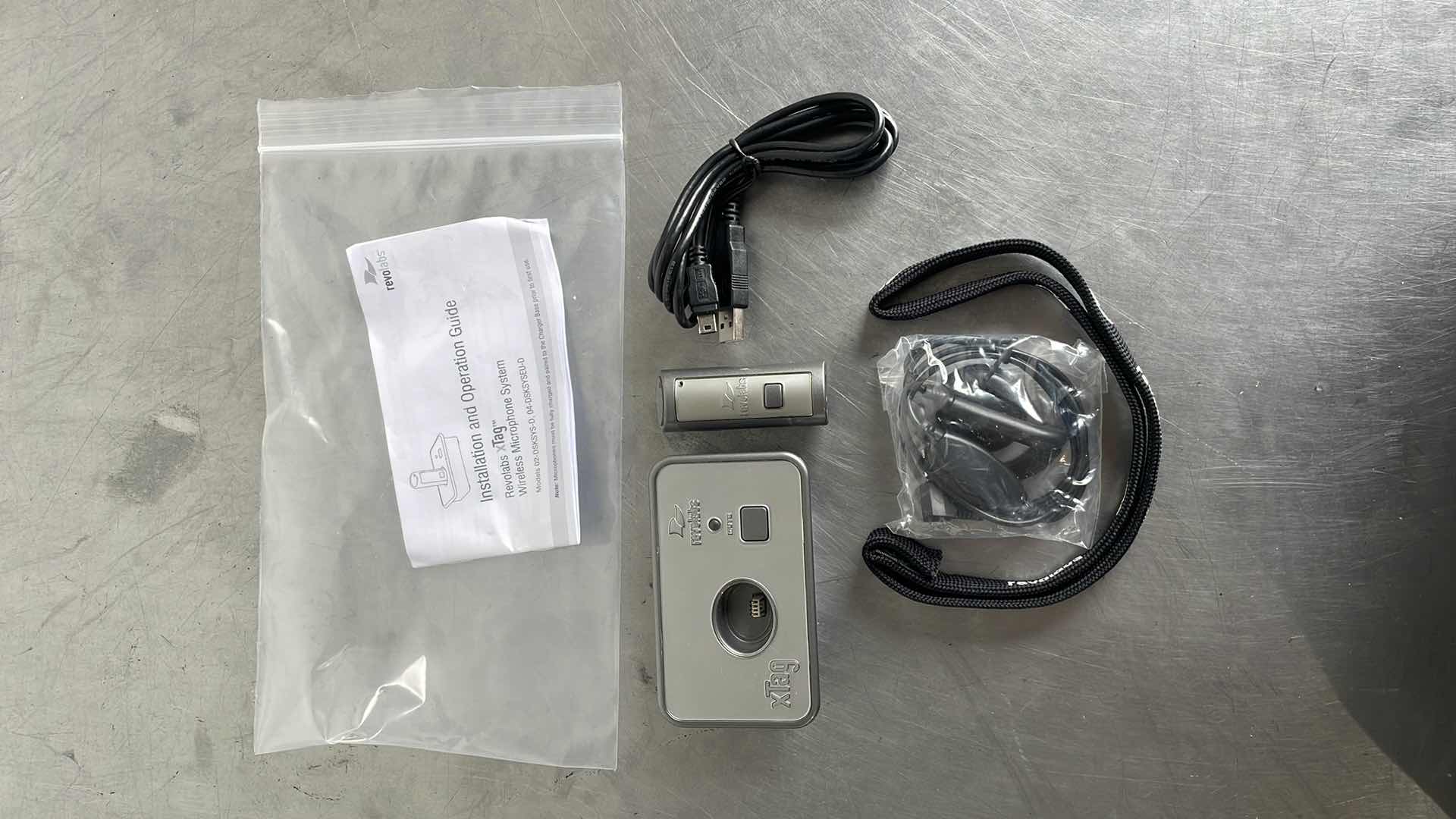 Photo 1 of REVOLAB XTAG WIRELESS USB MIC MODEL 02-DSKCHG-D