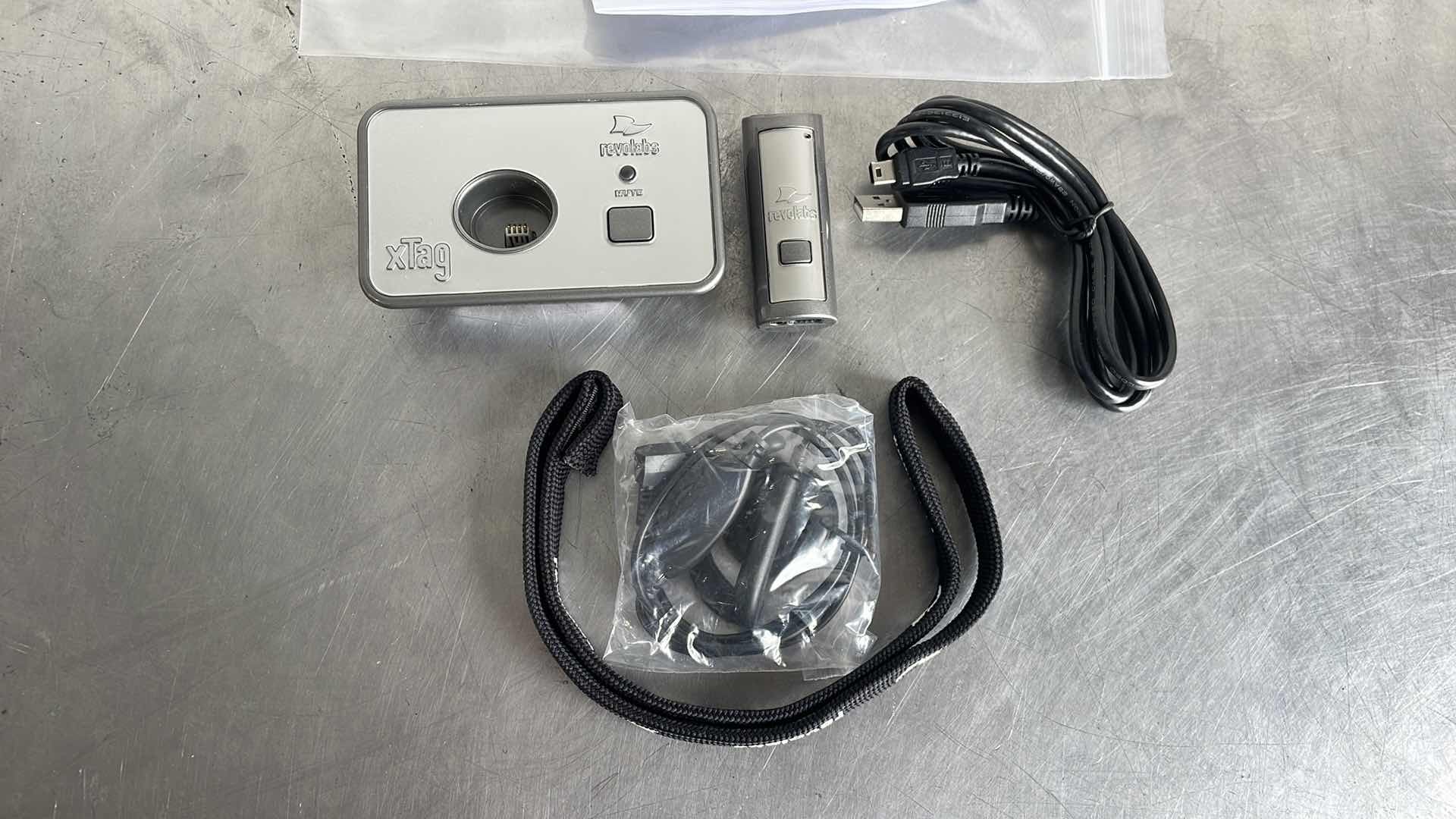 Photo 1 of REVOLAB XTAG WIRELESS USB MIC MODEL 02-DSKCHG-D