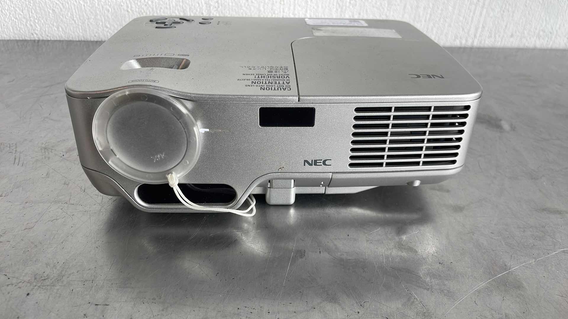 Photo 1 of NEC DLP PROJECTOR MODEL NP 60