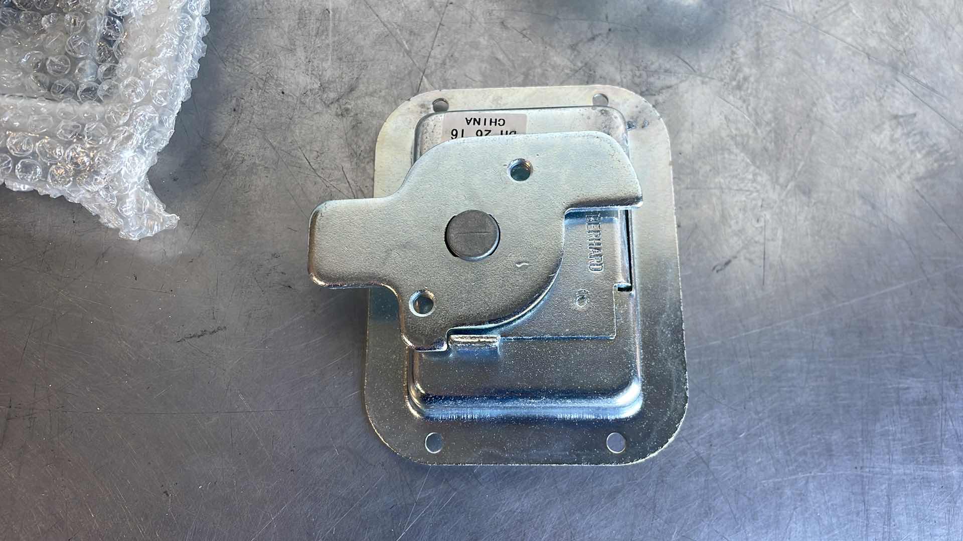 Photo 1 of STORAGE BOX DOOR LATCH (27)