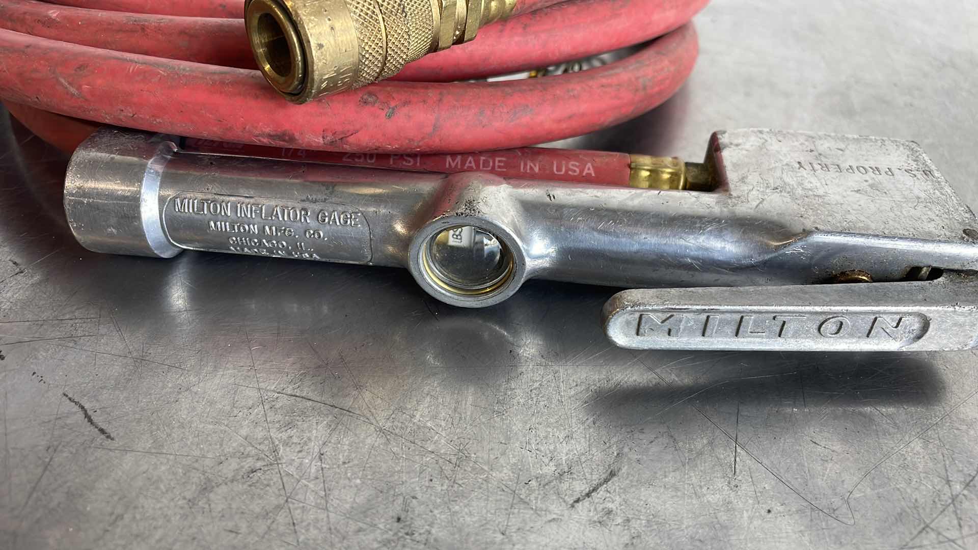 Photo 1 of 10' MILTON TIRE INFLATOR WITH GAUGE