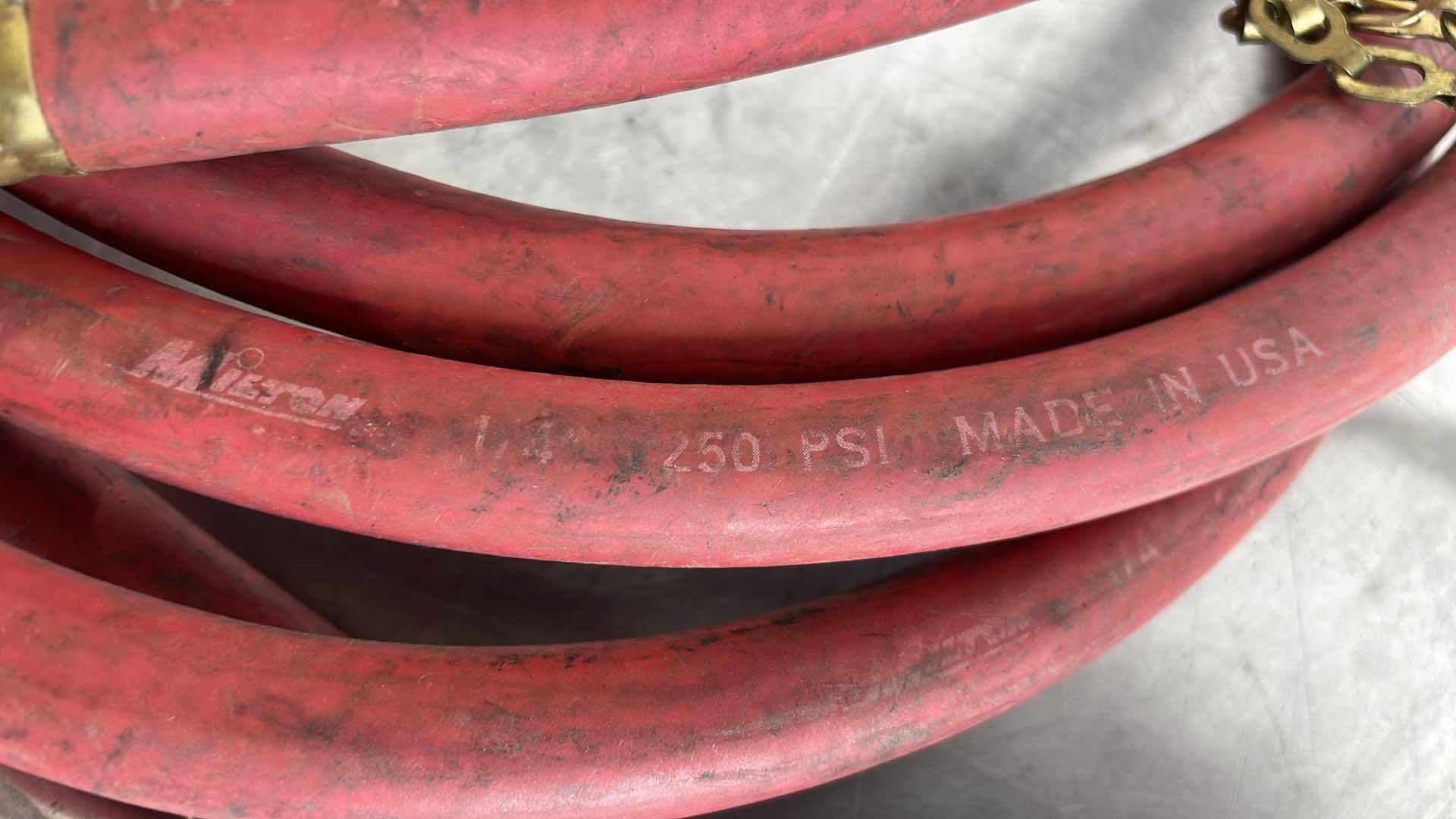 Photo 1 of 10' MILTON TIRE INFLATOR WITH GAUGE