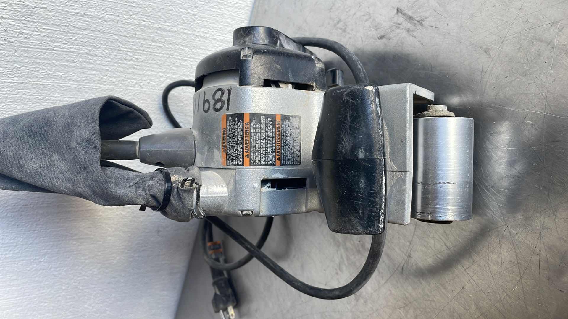 Photo 1 of PORTER CABLE VARIABLE SPEED BELT SANDER WITH DUST COLLECTION BELT SIZE 3” X 21”