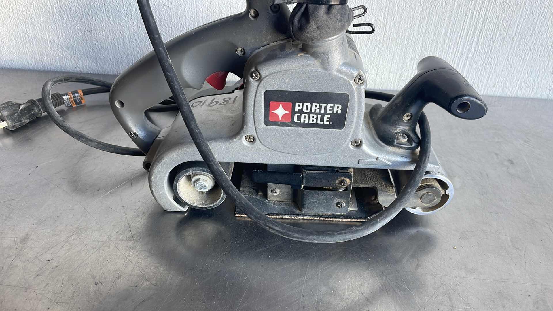 Photo 1 of PORTER CABLE VARIABLE SPEED BELT SANDER WITH DUST COLLECTION BELT SIZE 3” X 21”