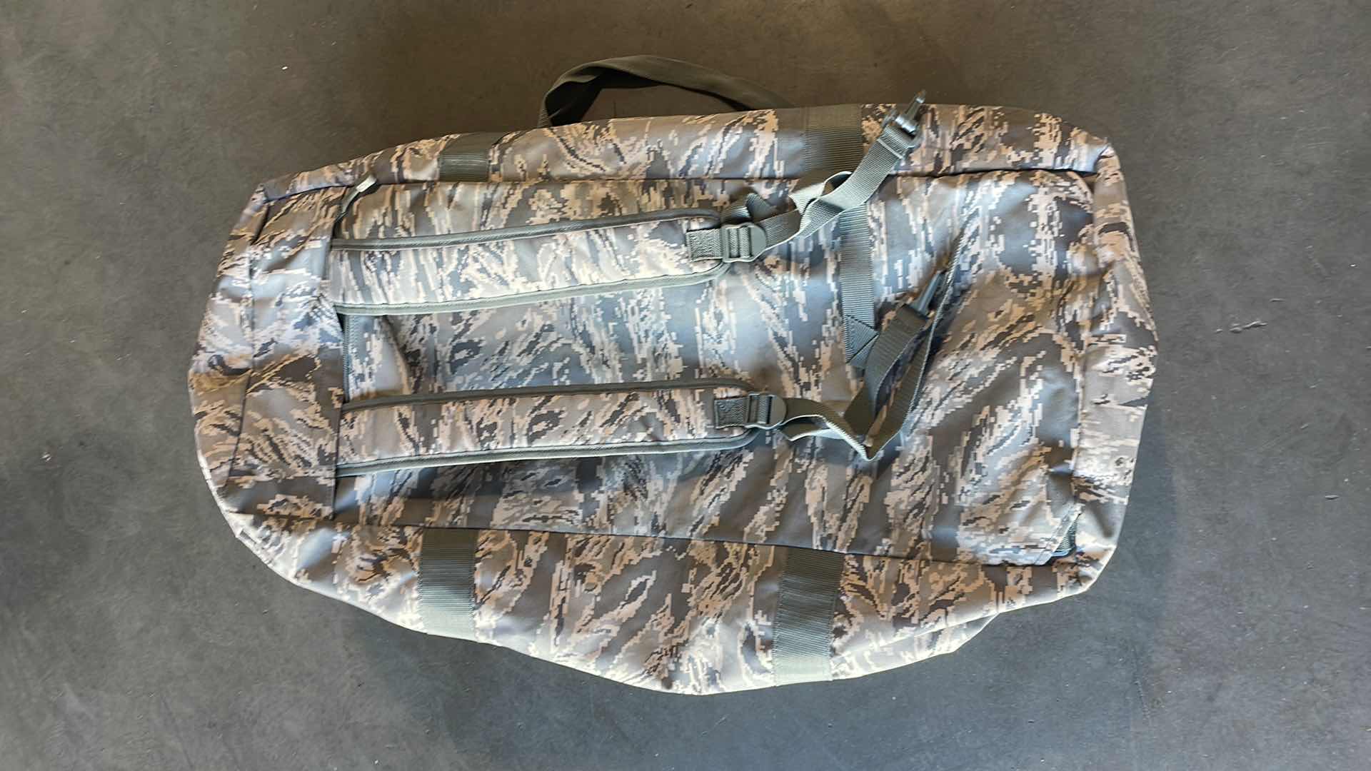 Photo 1 of MILITARY DUFFLE BAG WITH BACKPACK STRAPS