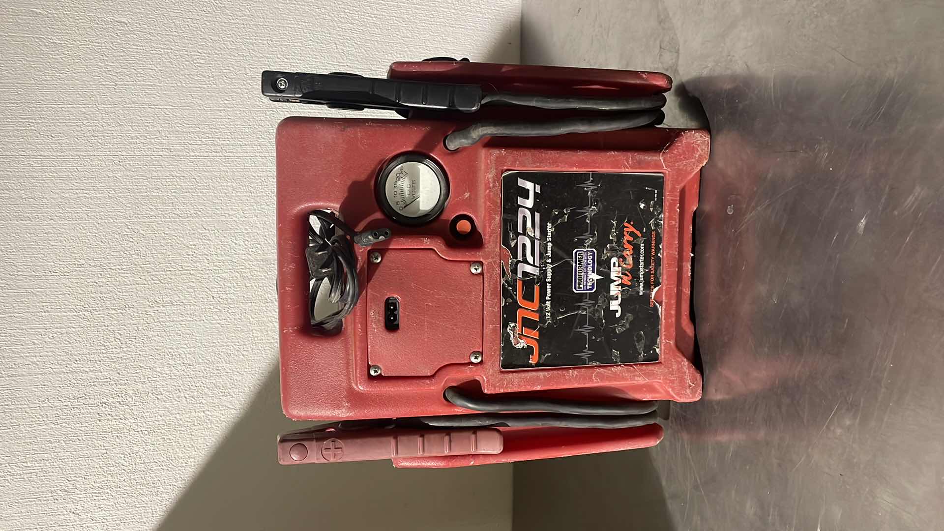 Photo 1 of JUMP AND CARRY 3400 PEAK AMP 12/24V JUMP STARTER MODEL JNC1224