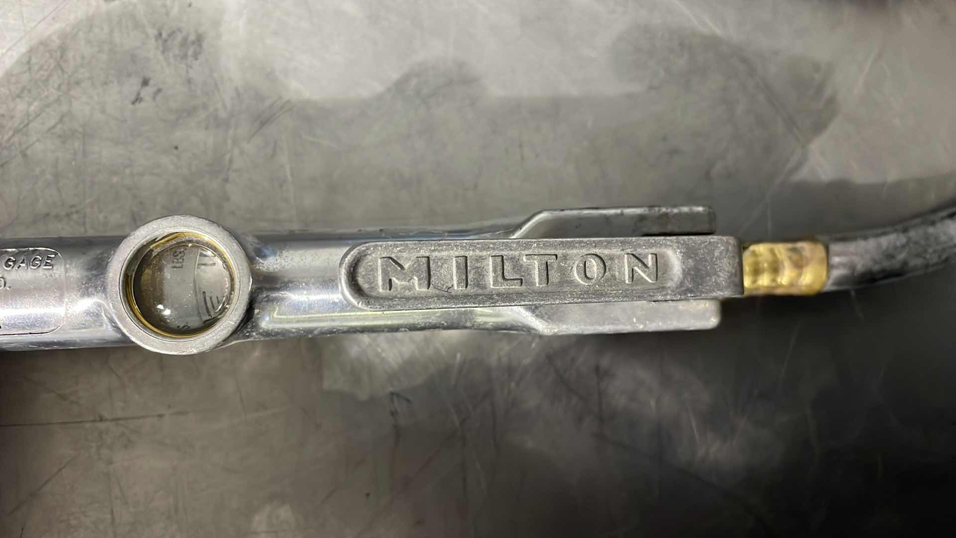 Photo 1 of MILTON S-506 INFLATOR GAUGE W/ GOODYEAR 200PSI HOSE & PHILLIPS GLADHAND