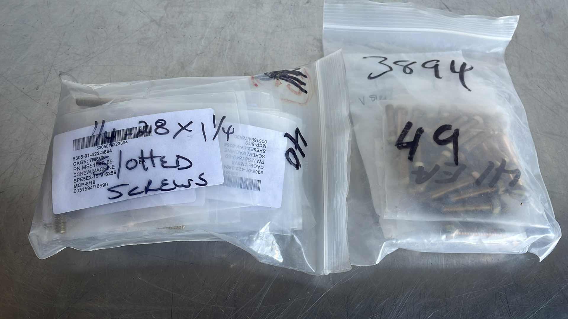 Photo 1 of 1/4”-28 x 1-1/4” SLOTTED SCREWS (89)