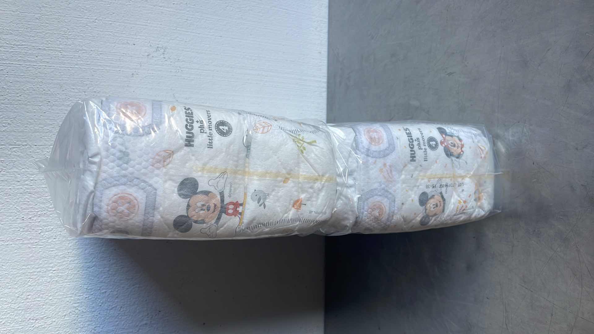 Photo 2 of HUGGIES PLUS LITTLE MOVERS SIZE 4