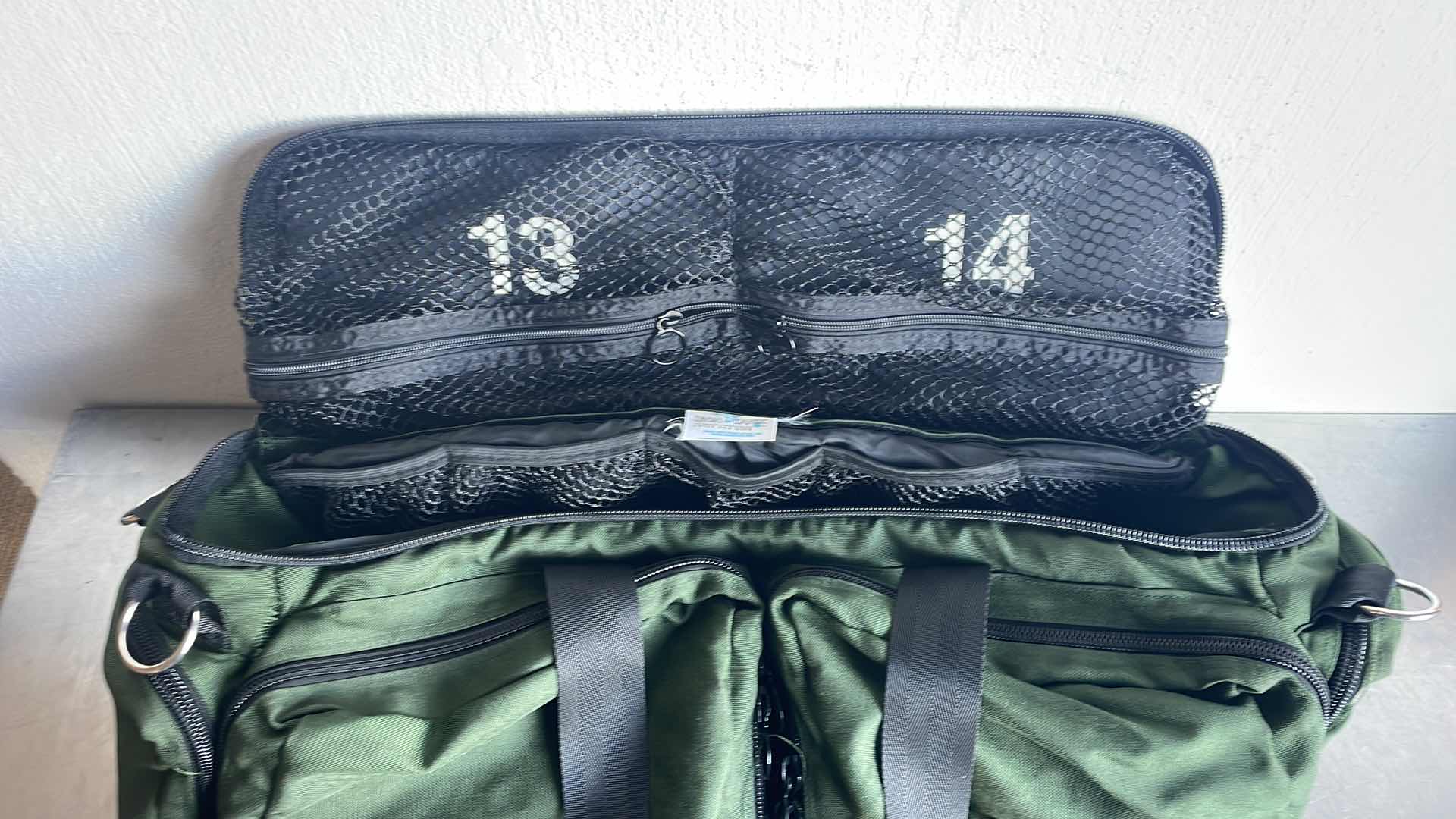 Photo 1 of IRON DUCK MULTI COMPARTMENT BAG 24” x 12” x10”