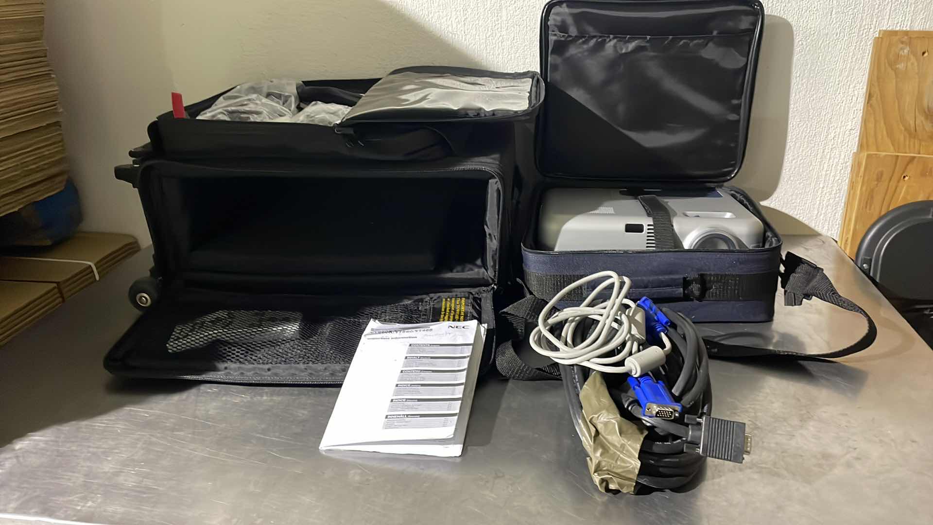 Photo 1 of NEC MULTI MEDIA LCD PROJECTOR -  NEC VT 465  WITH ROLLING CASE, CARRYING CASE AND LOTS OF CORDS