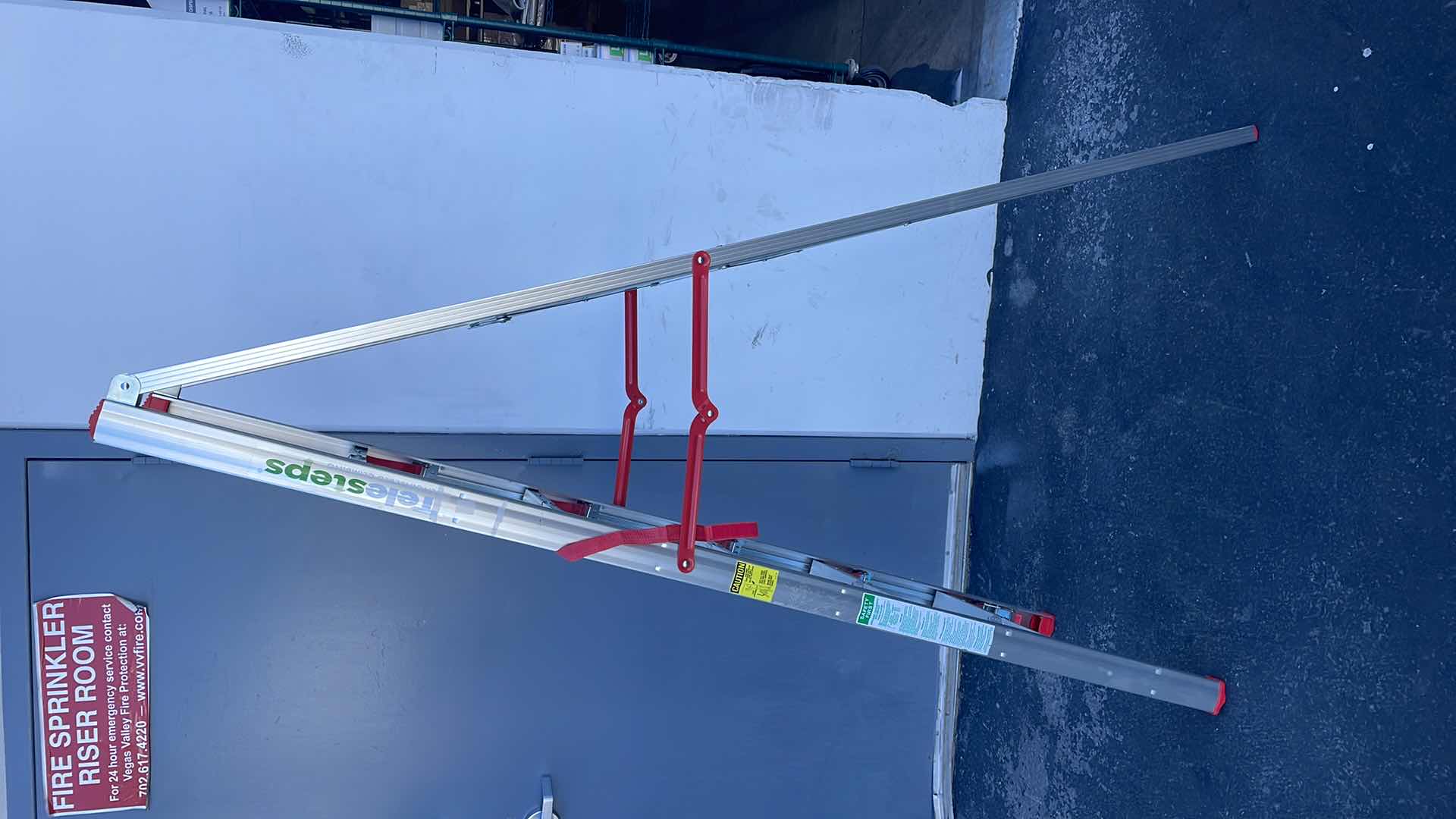 Photo 1 of TELESTEPS 6’ STEPLADDER TYPE 1 HEAVYDUTY MODEL600FLS