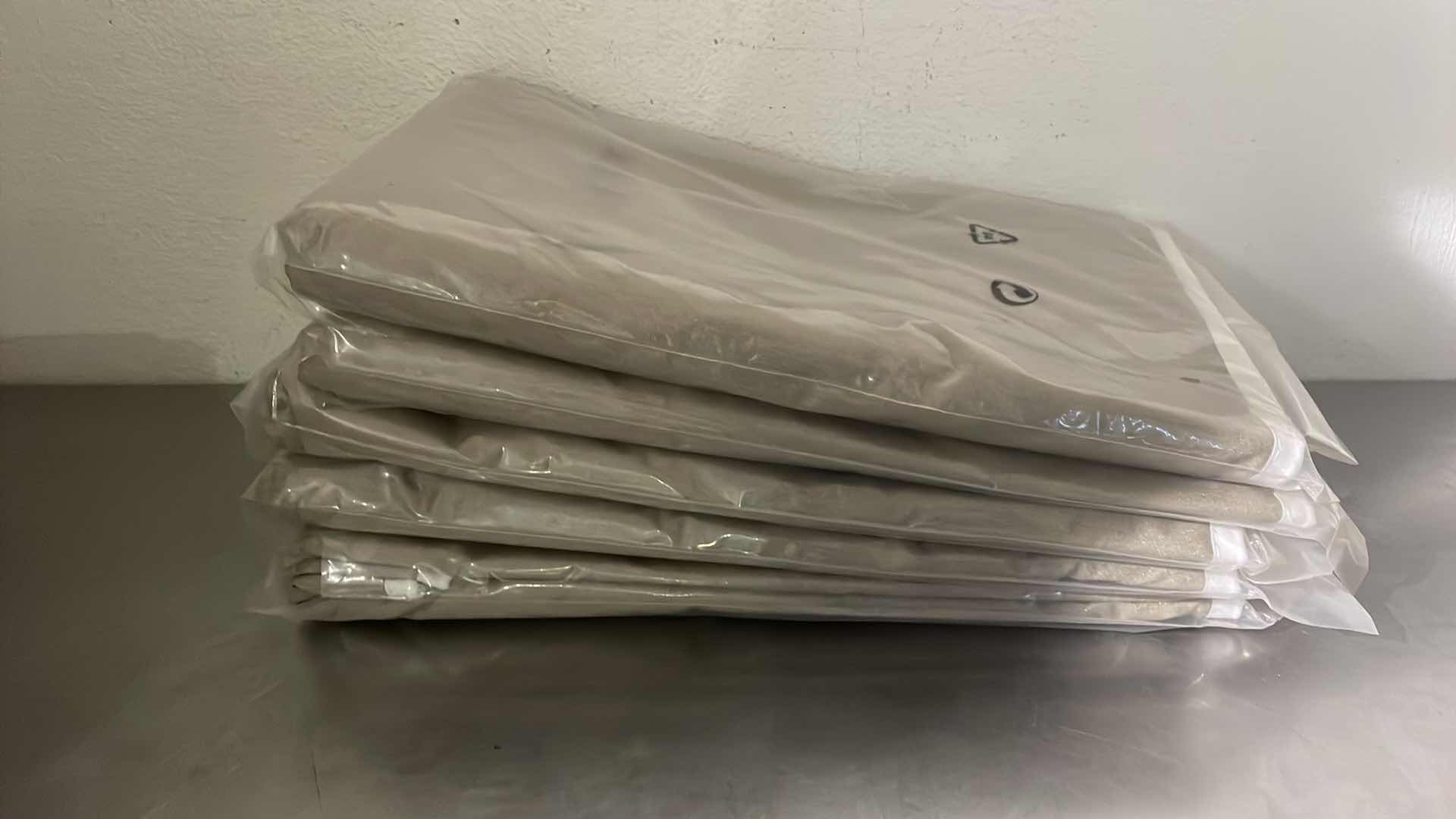 Photo 1 of IRONING BOARD COVERS (5)