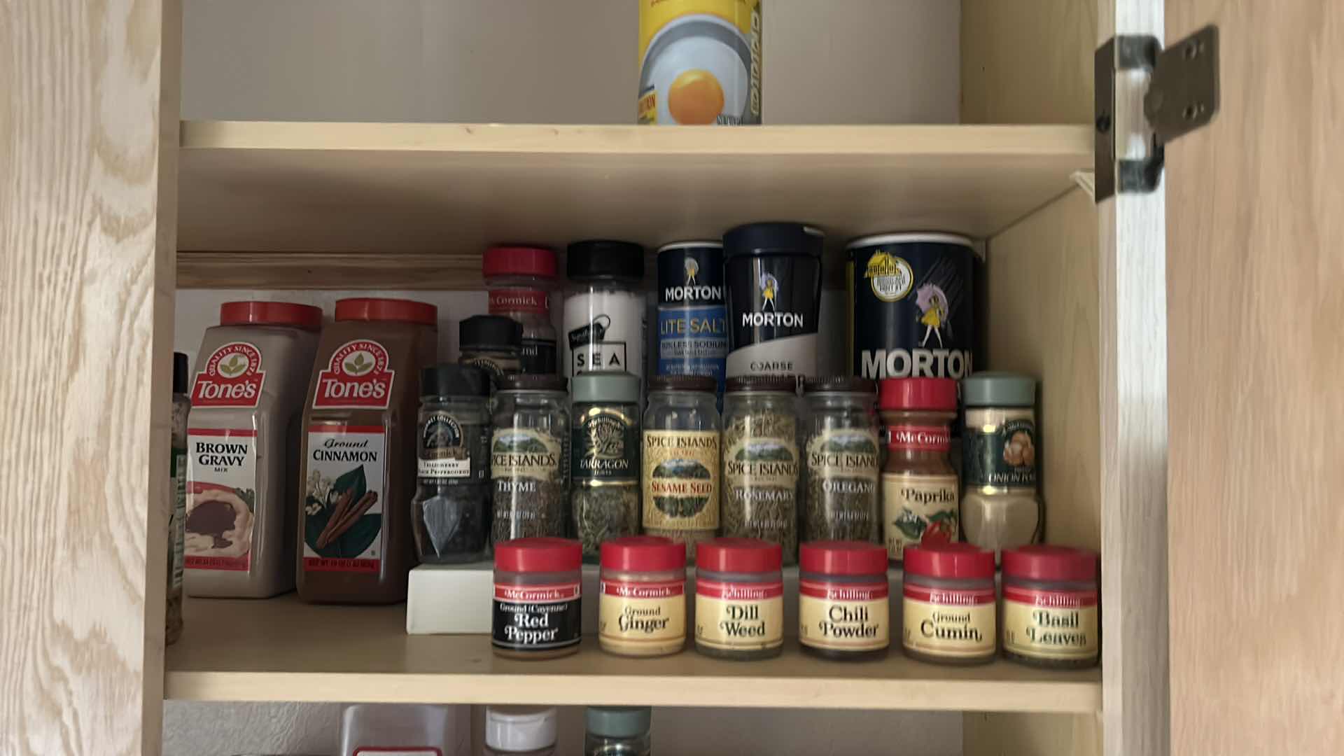 Photo 1 of CONTENTS IN KITCHEN CABINET- SPICES