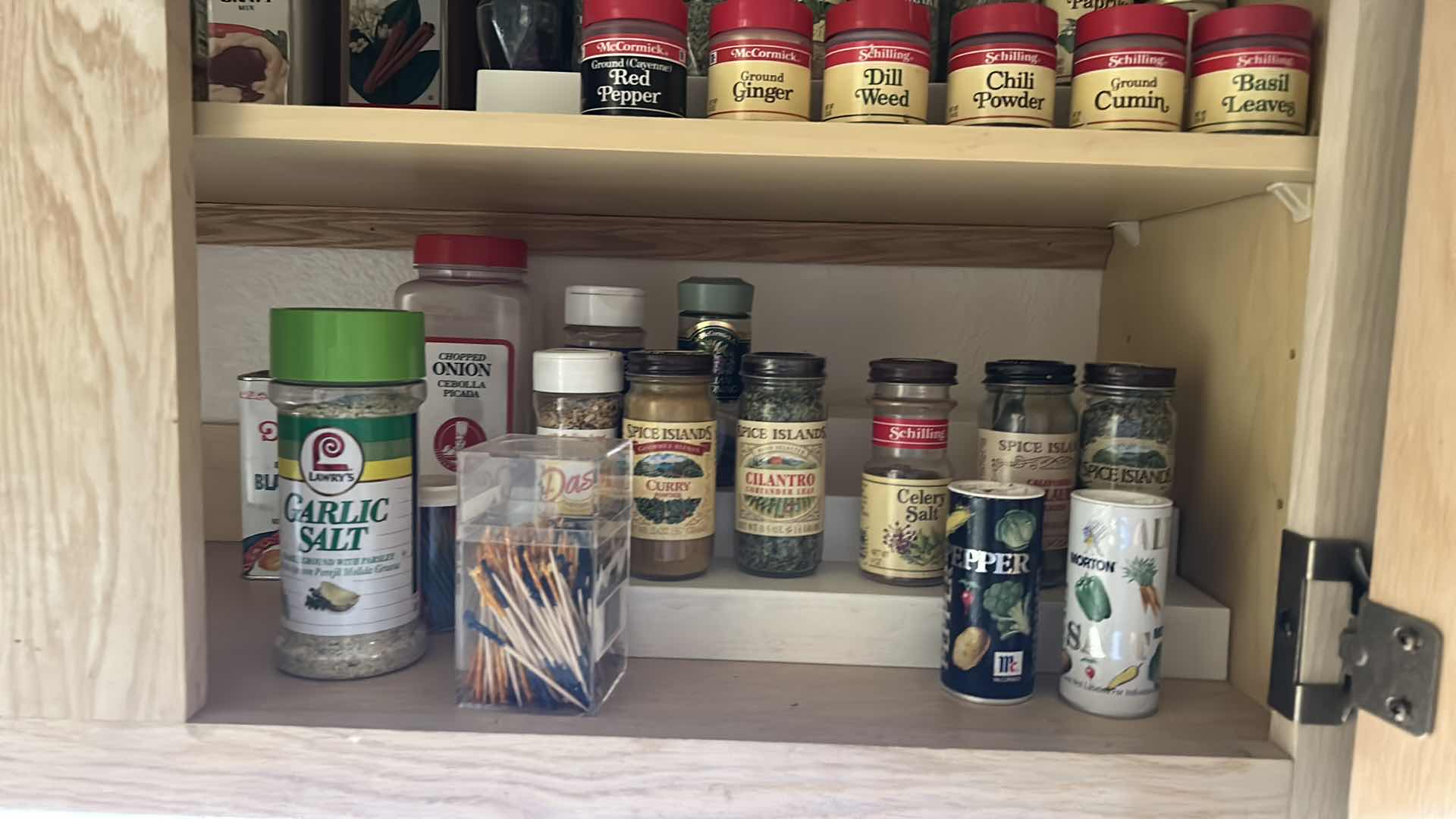 Photo 1 of CONTENTS IN KITCHEN CABINET- SPICES