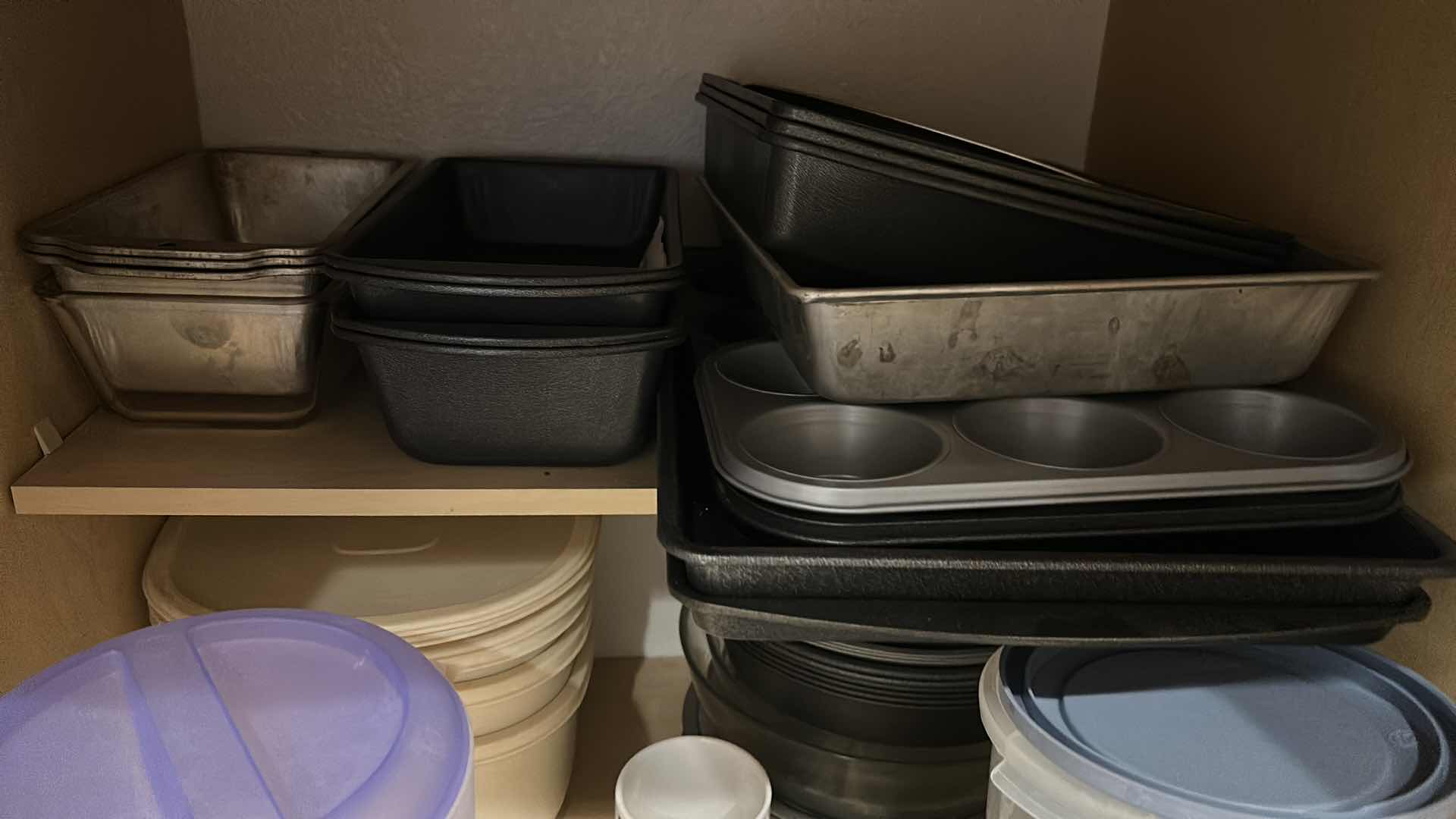 Photo 1 of CONTENTS OF CABINET NEXT TO FRIDGE IN KITCHEN - BAKING ITEMS, TUPPERWARE AND MORE