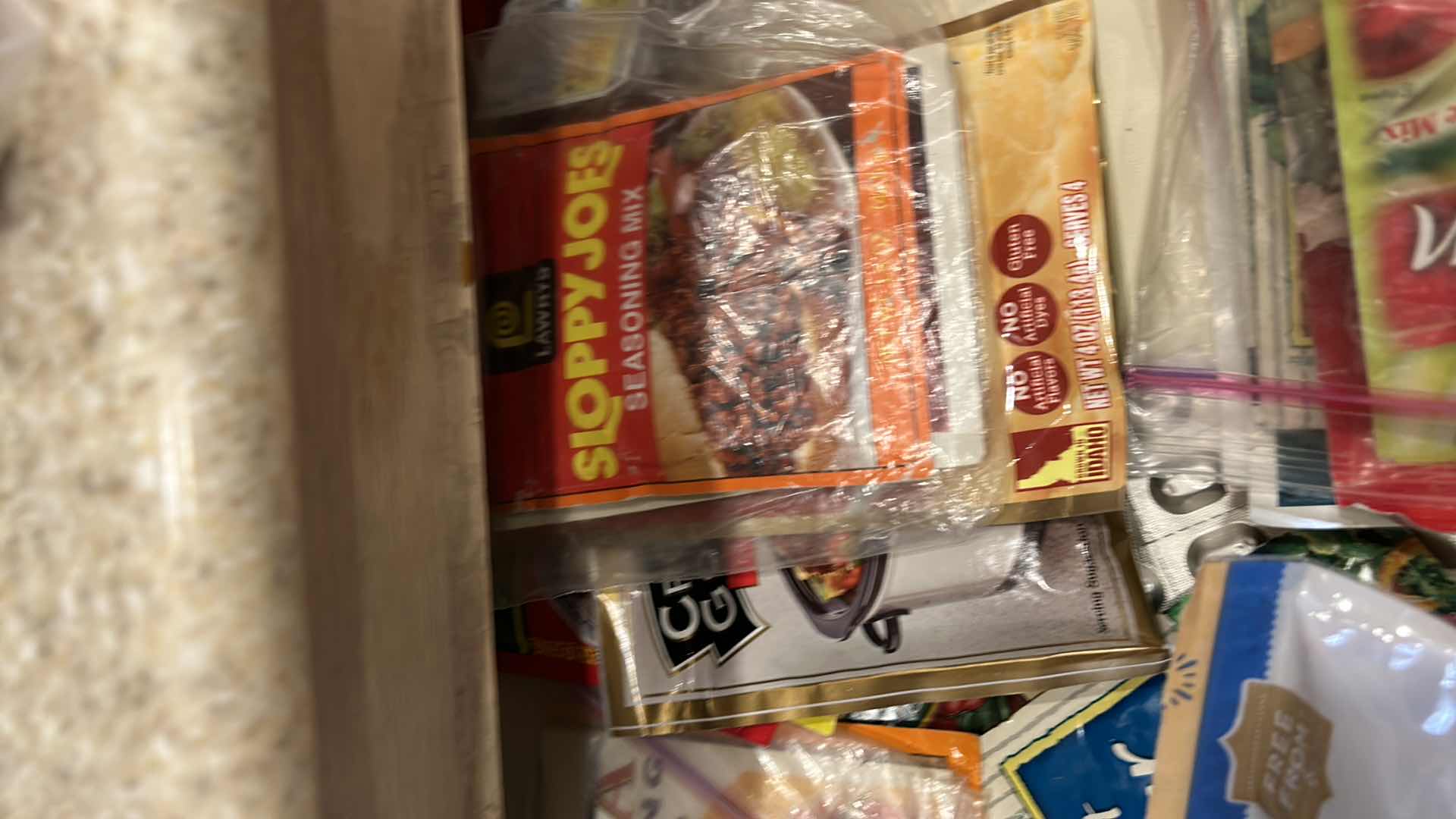 Photo 1 of CONTENTS OF PULL OUT DRAWER IN KITCHEN- SEASONING MIXES AND MORE