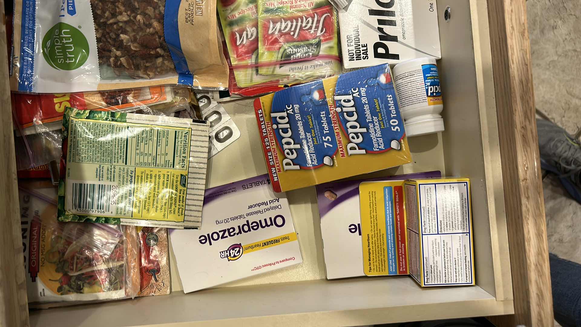 Photo 1 of CONTENTS OF PULL OUT DRAWER IN KITCHEN- SEASONING MIXES AND MORE