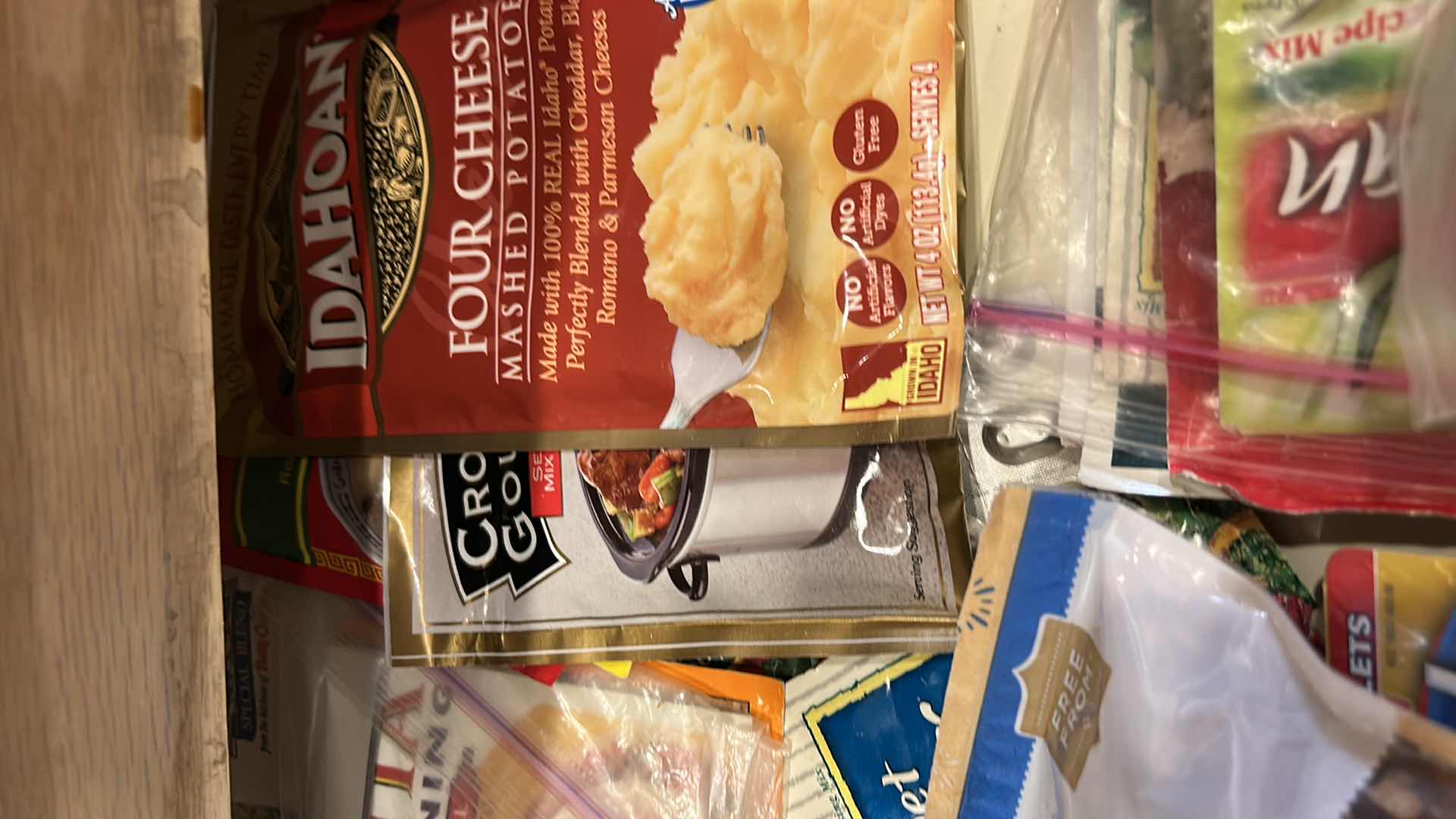 Photo 1 of CONTENTS OF PULL OUT DRAWER IN KITCHEN- SEASONING MIXES AND MORE