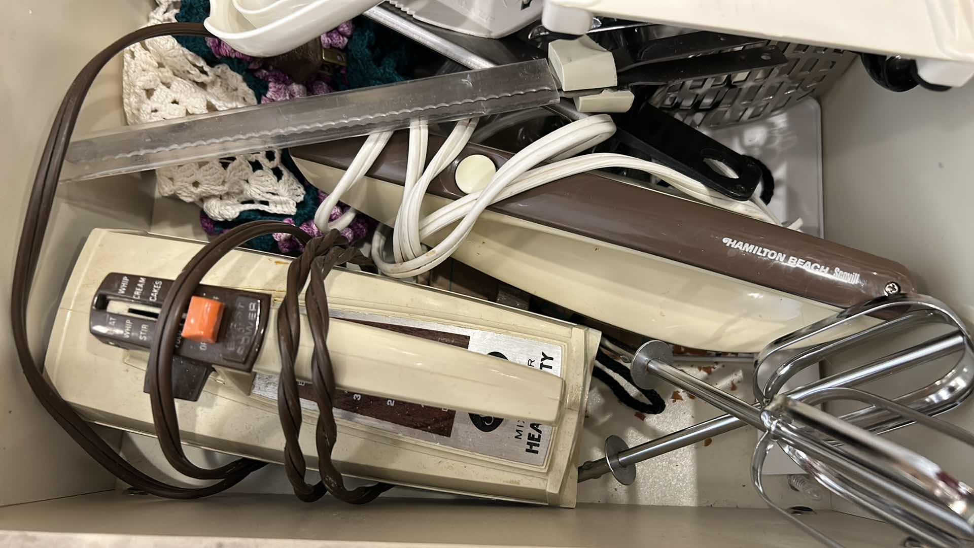 Photo 3 of CONTENTS OF PULL OUT DRAWER IN KITCHEN, MIXER, ELECTRIC KNIFE AND MORE