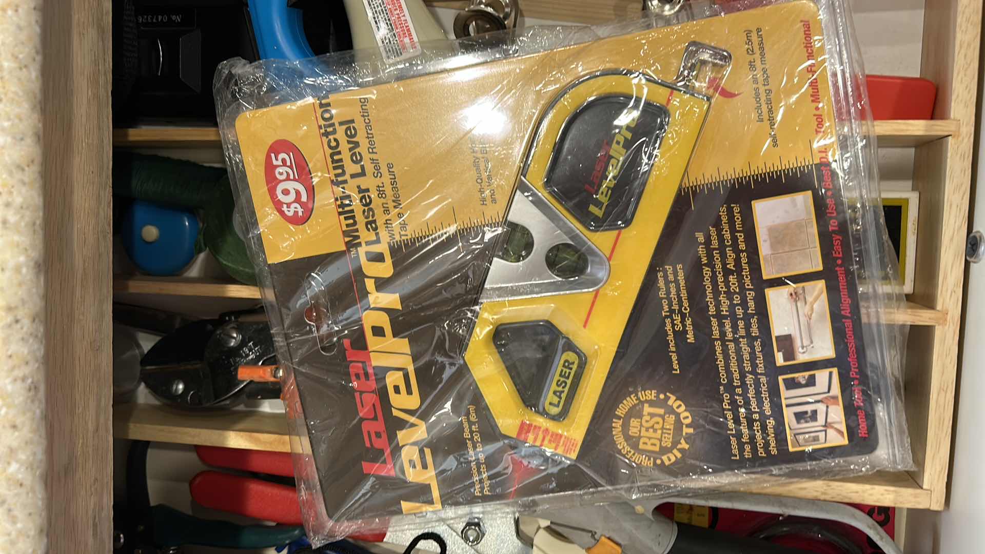 Photo 1 of CONTENTS OF PULL OUT DRAWER IN KITCHEN, MOSTLY TOOLS