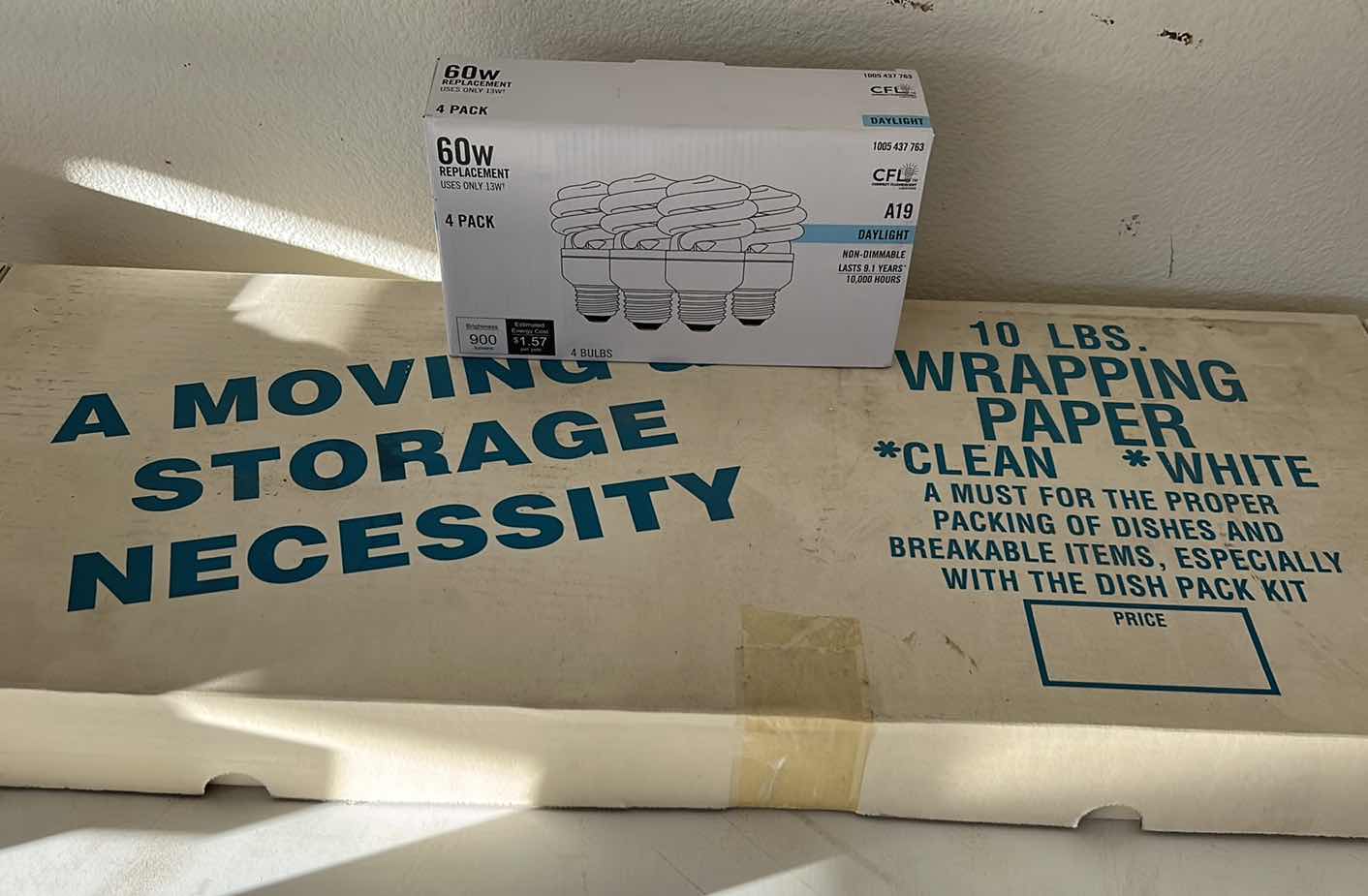 Photo 1 of 10 LBS MOVING WRAPPING PAPER AND 4 PACK 60 WATT BULBS