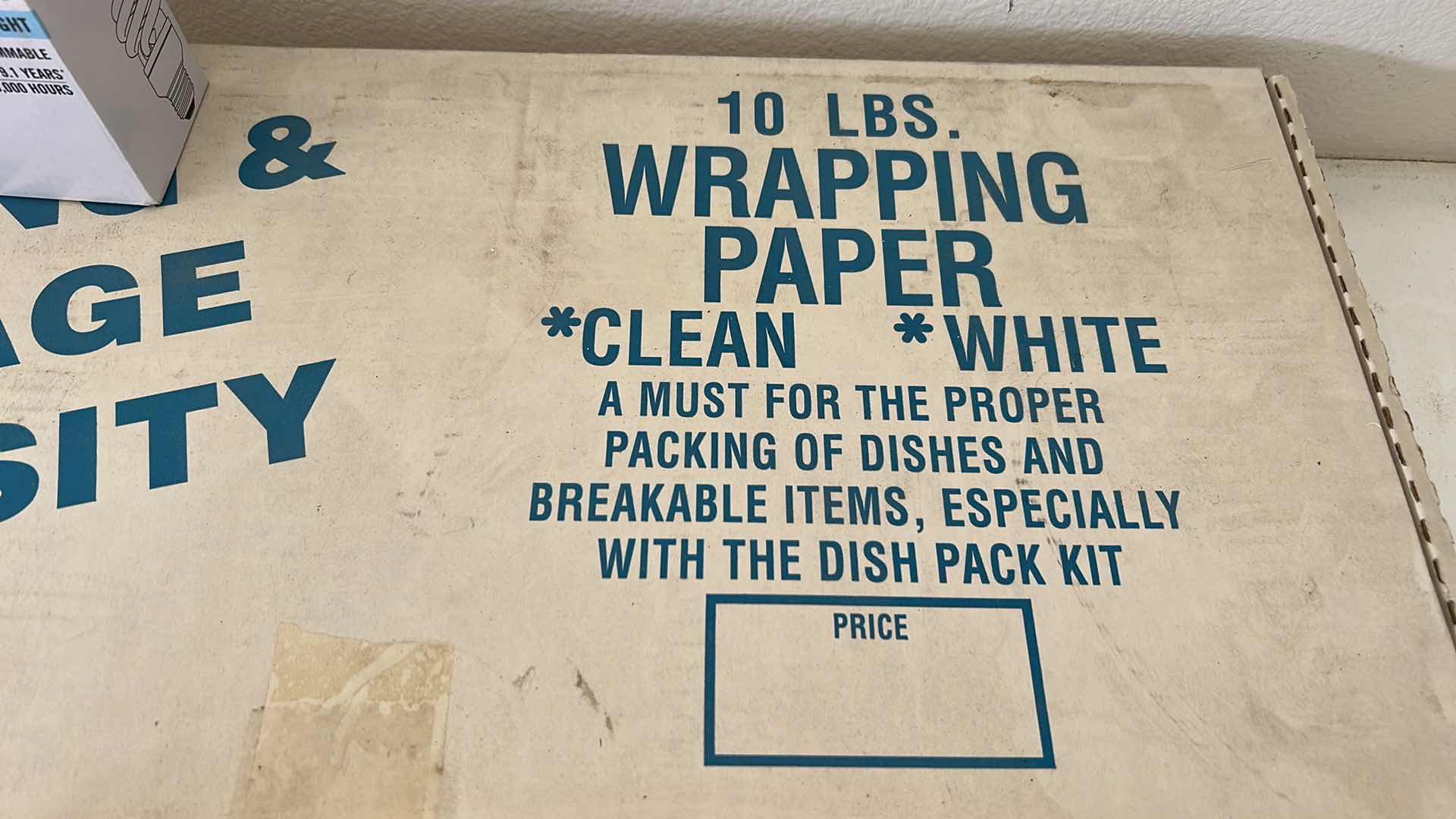 Photo 2 of 10 LBS MOVING WRAPPING PAPER AND 4 PACK 60 WATT BULBS