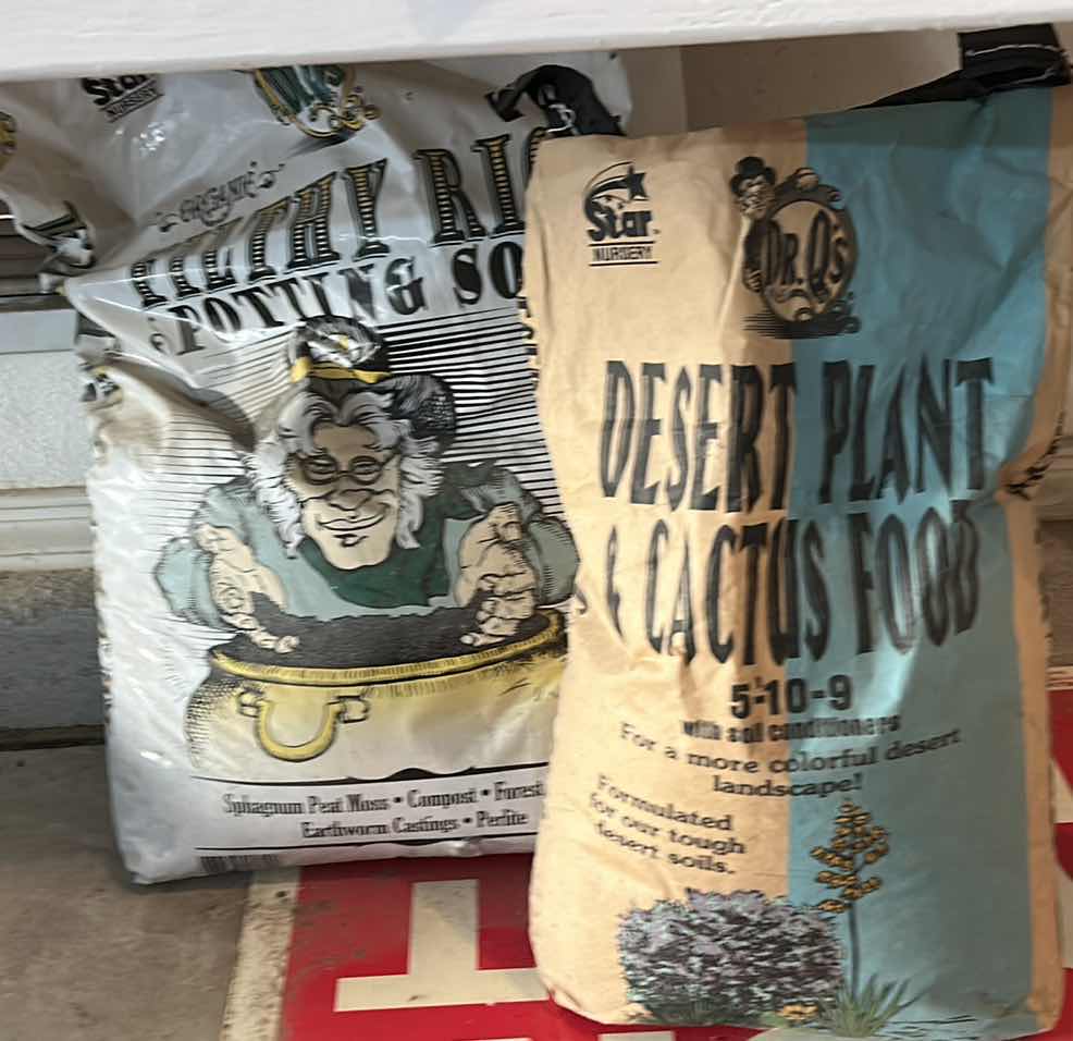 Photo 1 of GARDENING- POTTING SOIL AND DESERT PLANT FOOD