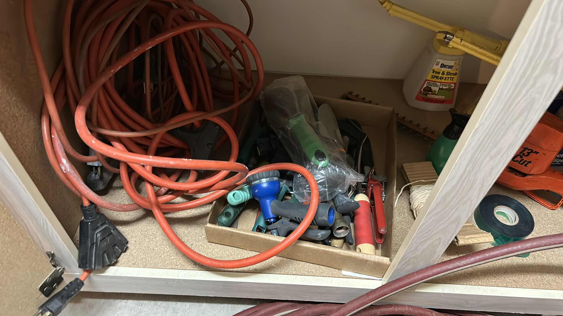 Photo 1 of CONTENTS OF SHELF IN GARAGE INCLUDING LARGE HOSE