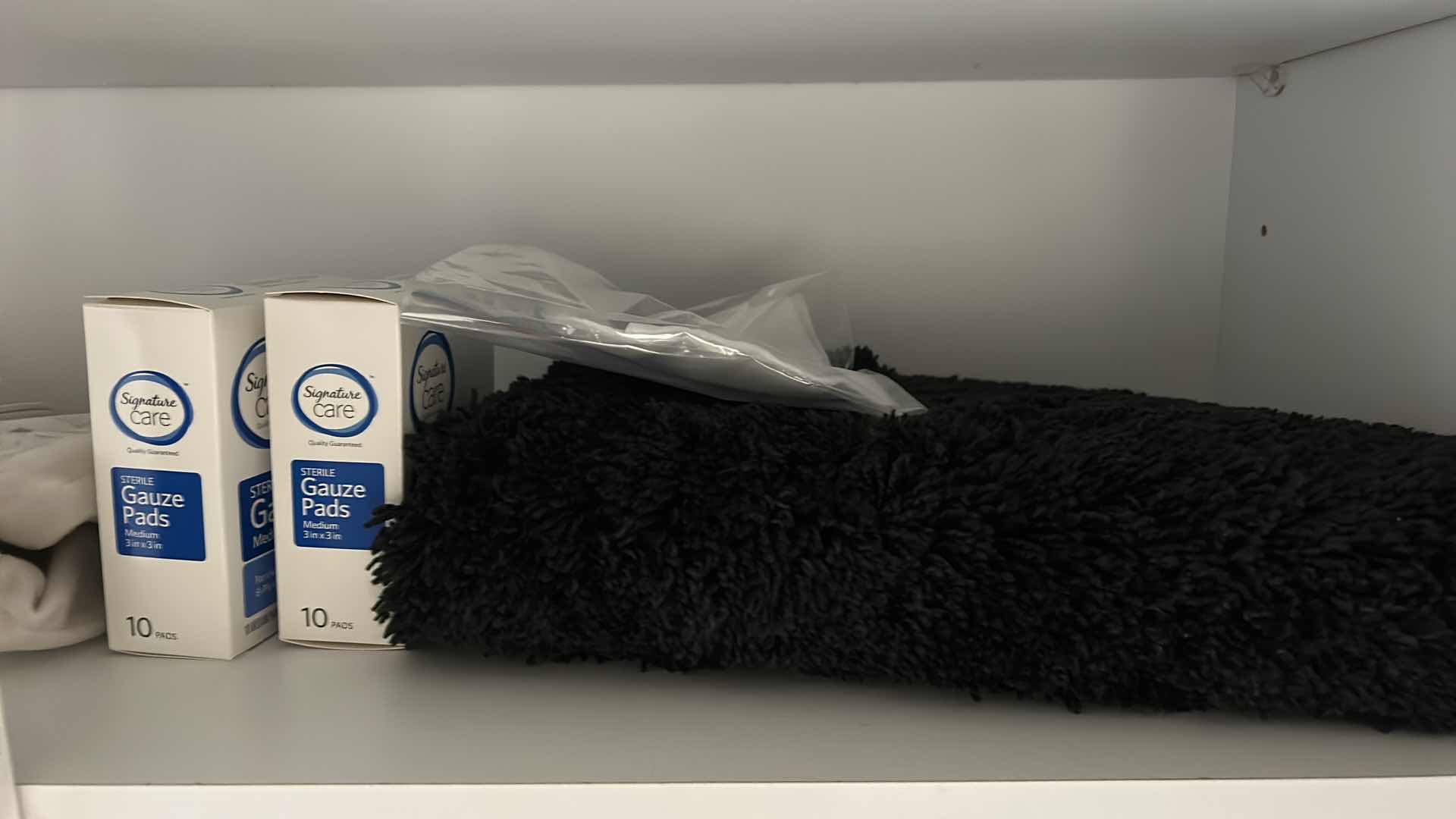 Photo 1 of CONTENTS OF 3 SHELVES IN BATHROOM