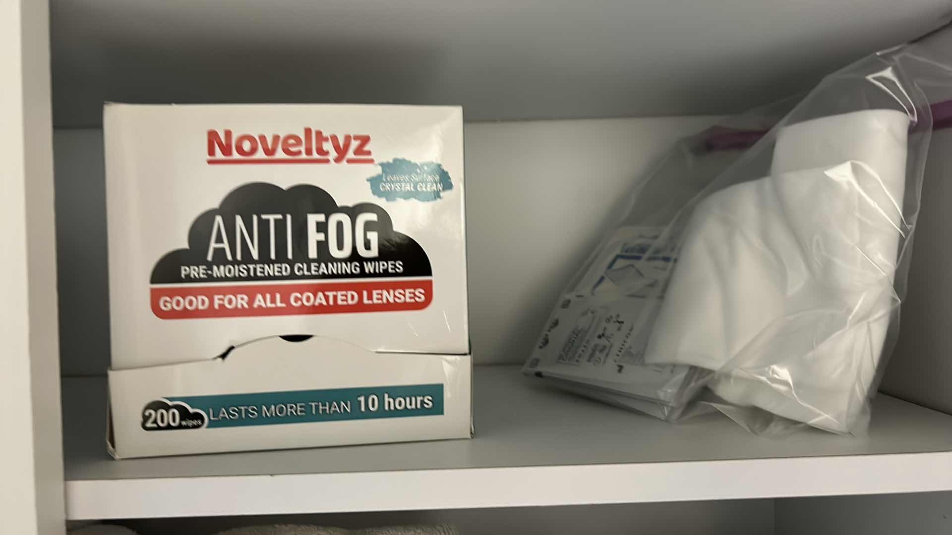 Photo 1 of CONTENTS OF 3 SHELVES IN BATHROOM