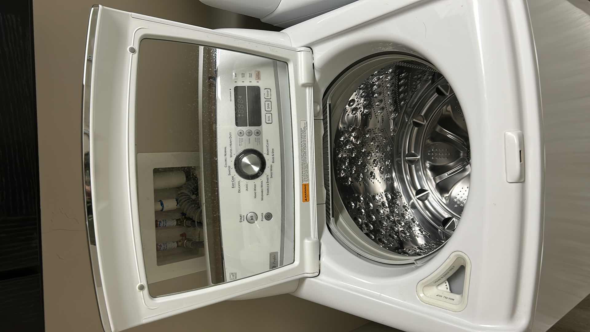 Photo 2 of GE PROFILE TOP LOADING WASHING MACHINE