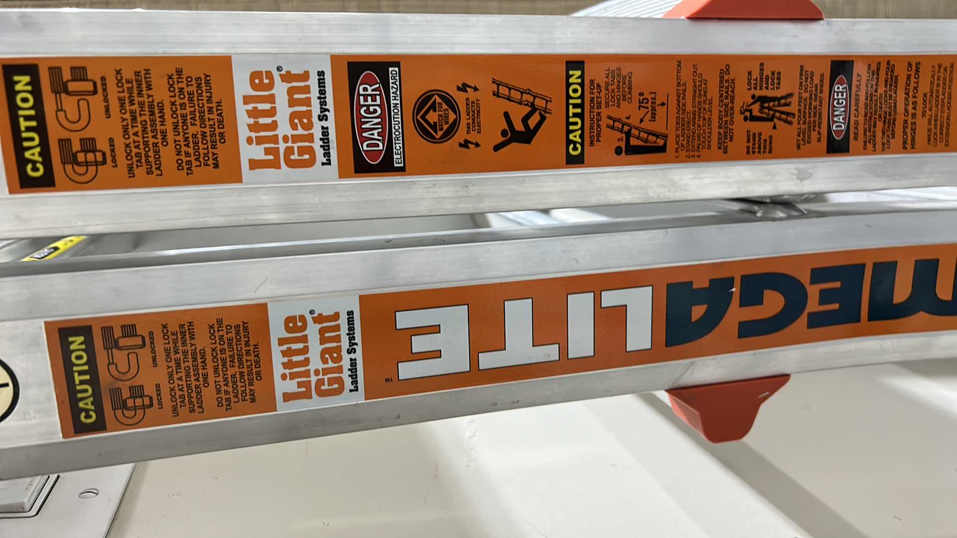 Photo 2 of MEGALITE LITTLE GIANT ADJUSTABLE LADDER