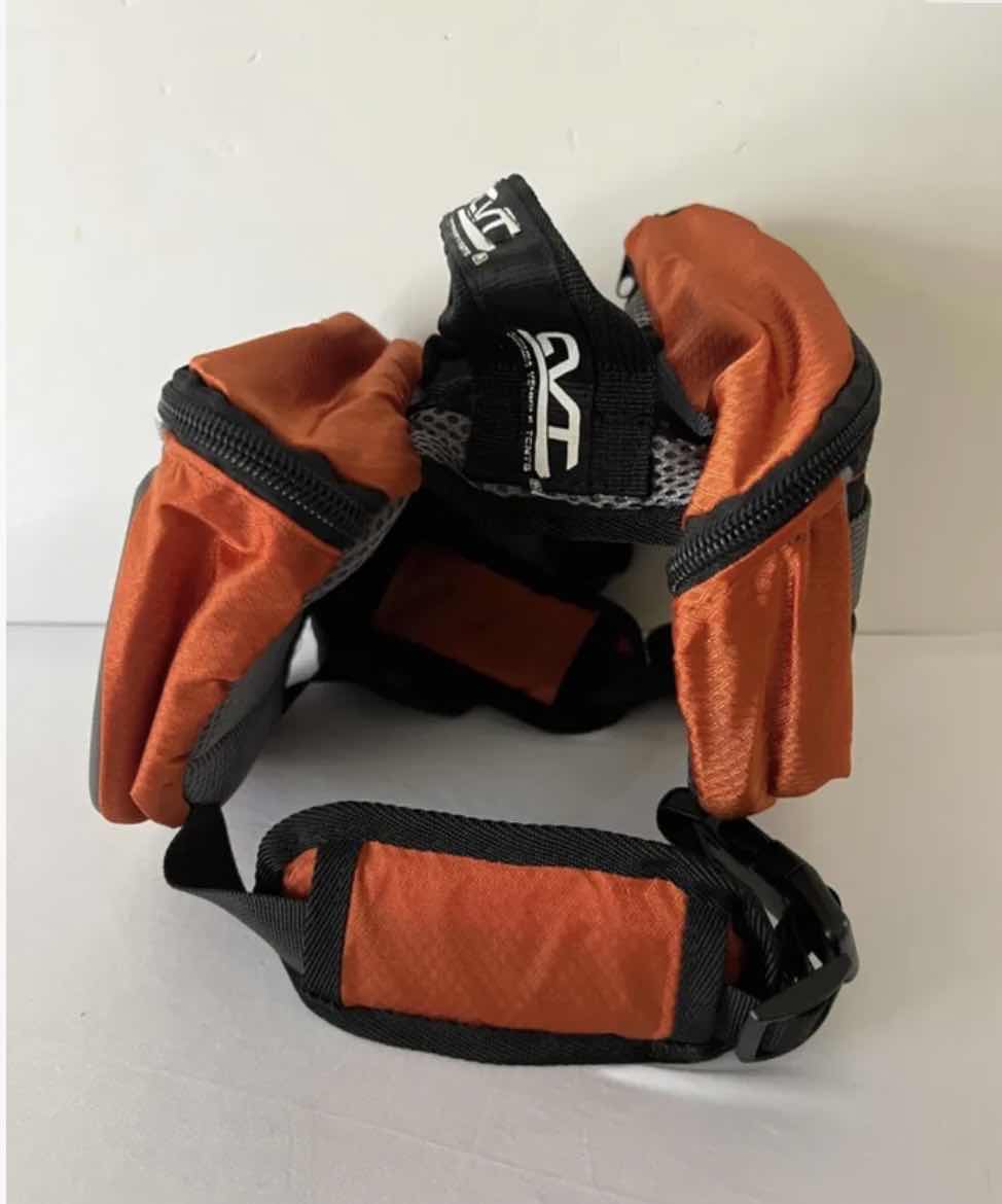 Photo 1 of NEW DOG ASSORTMENT- 2 SMALL CVT BACKPACKS/SADDLE BAGS AND 6 ALPHA PAWS TENNIS BALLS  $60