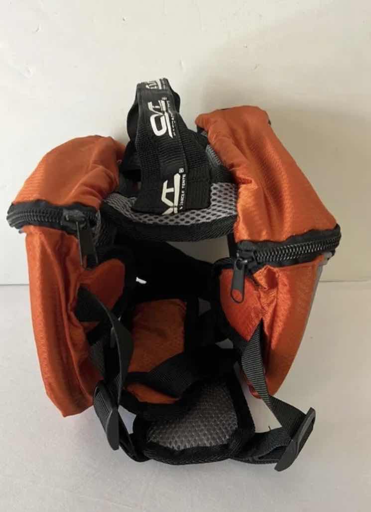 Photo 1 of NEW DOG ASSORTMENT- 2 SMALL CVT BACKPACKS/SADDLE BAGS AND 6 ALPHA PAWS TENNIS BALLS  $60