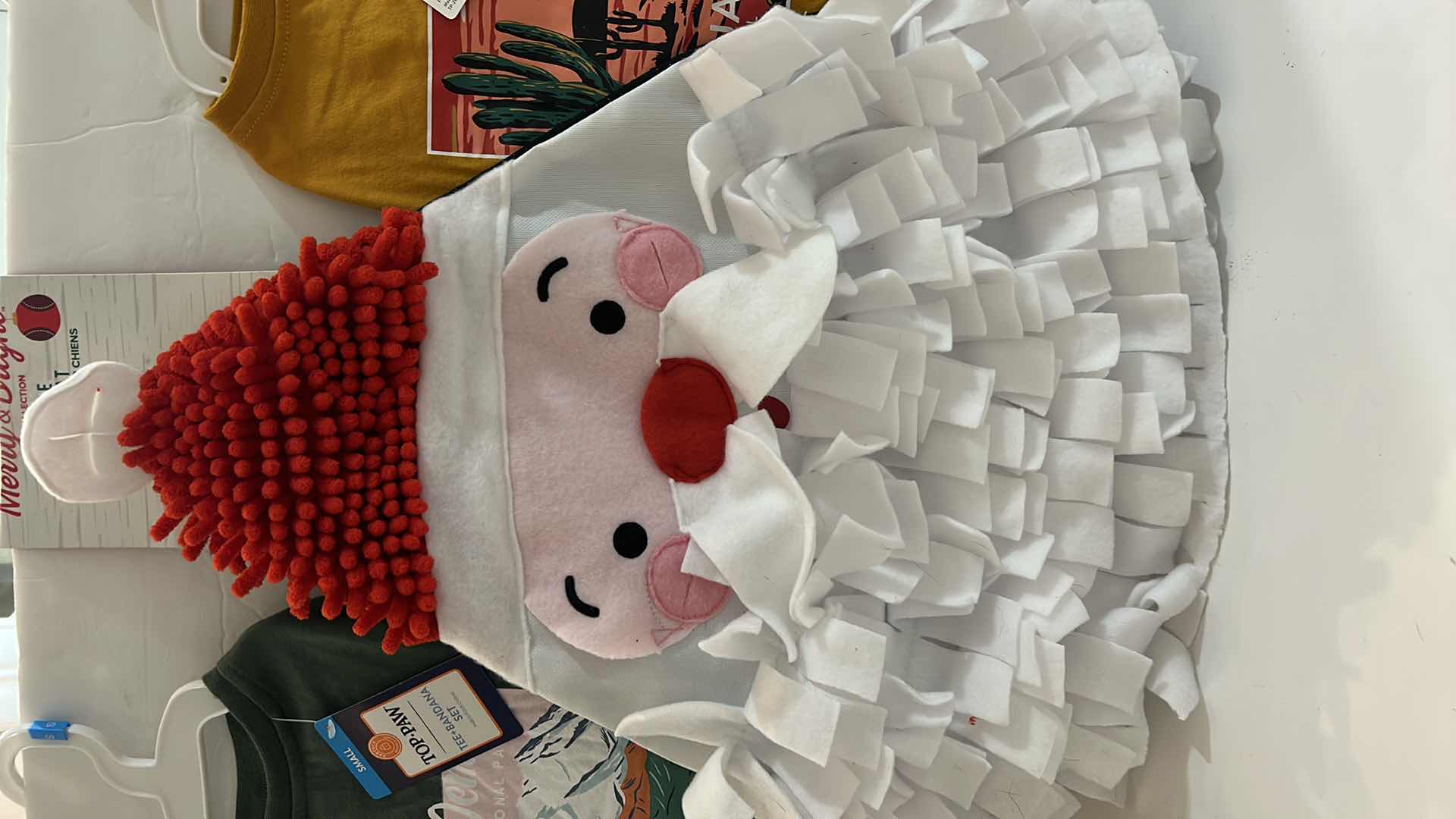 Photo 1 of NEW SMALL DOG ASSORTMENT, 1 BACKPACK/SADDLE BAG, 2 TOP PAW TEE SHIRTS, 4 COLLARS, 1 TOP PAW DOG HAT AND A SNUFFLE MAT