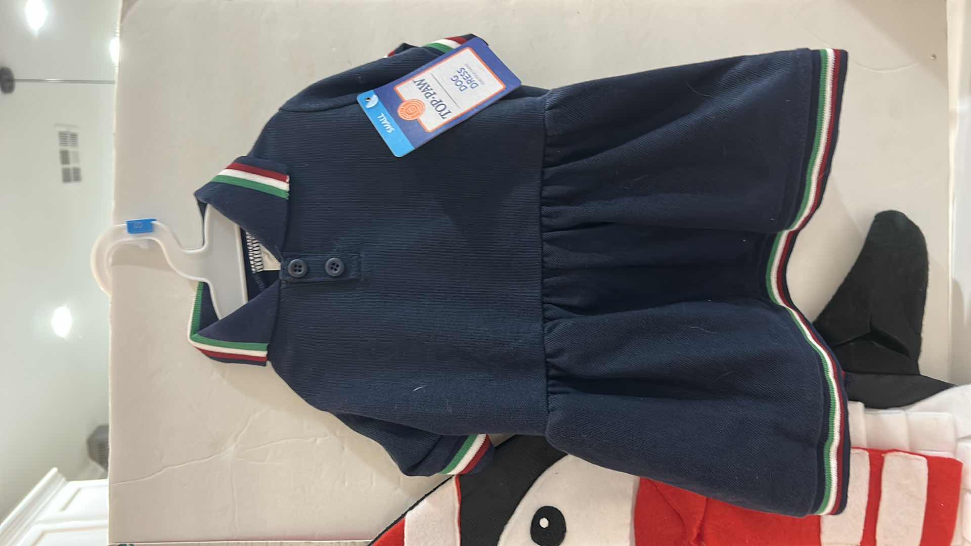 Photo 1 of NEW SMALL DOG ASSORTMENT, 1 BACKPACK/SADDLE BAG, 2 TOP PAW SHIRTS, 4 COLLARS, 1 TOP PAW DOG HAT AND A SNUFFLE MAT