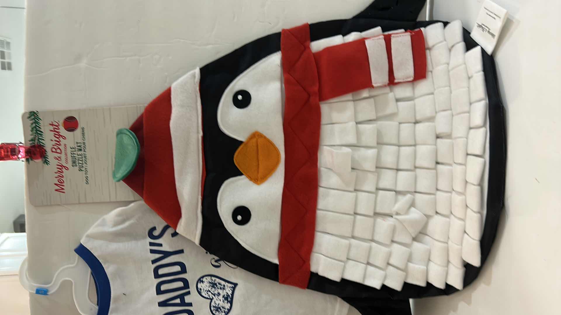 Photo 1 of NEW SMALL DOG ASSORTMENT, 1 BACKPACK/SADDLE BAG, 2 TOP PAW TEE SHIRTS, 4 XS COLLARS, 1 TOP PAW DOG HAT AND A SNUFFLE MAT