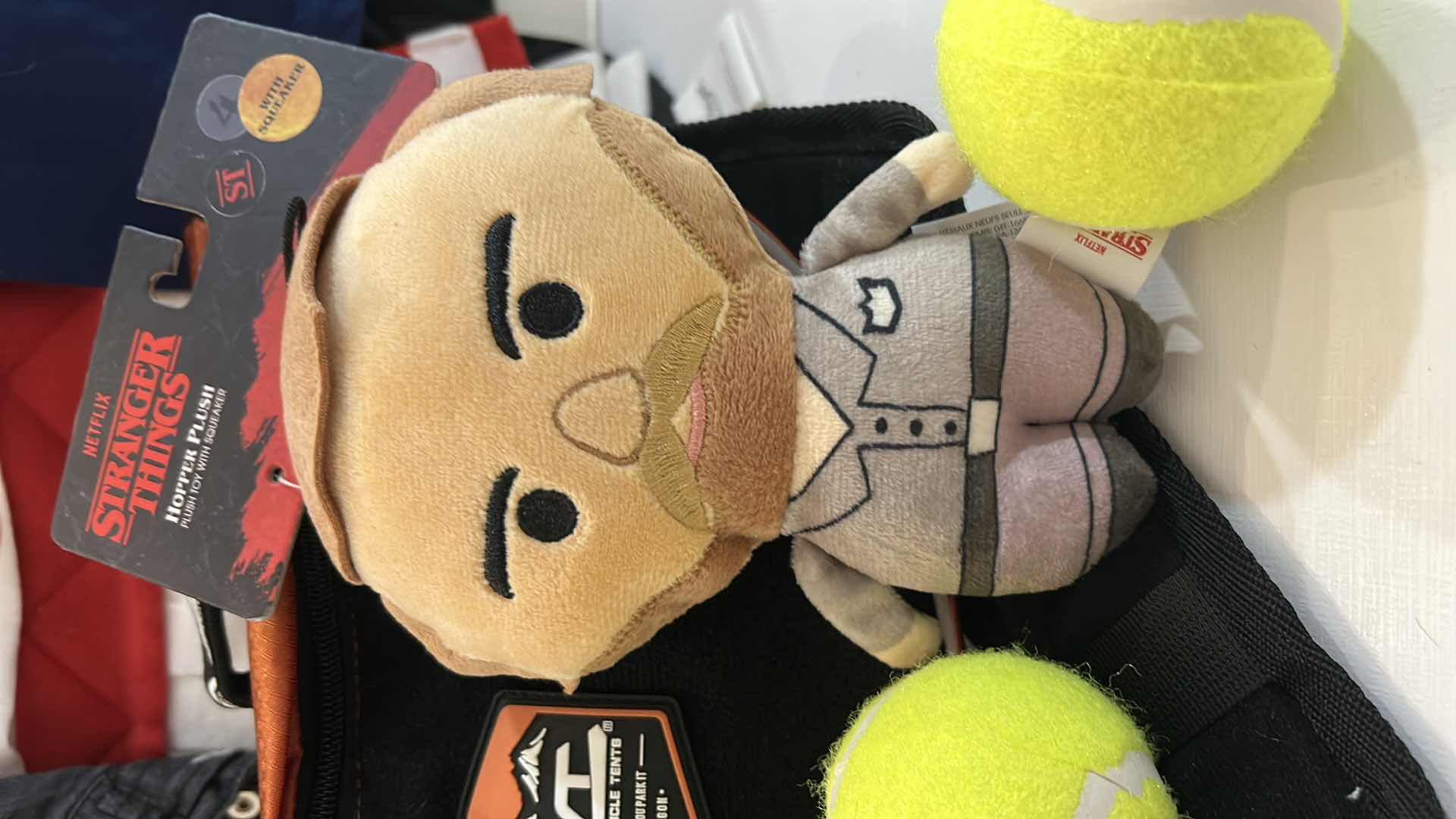 Photo 1 of NEW SMALL DOG ASSORTMENT, 1 BACKPACK/SADDLE BAG, 2 TOP PAW TEE SHIRTS, 1 SNUFFLE MAT, 1 SQUEAKER TOY