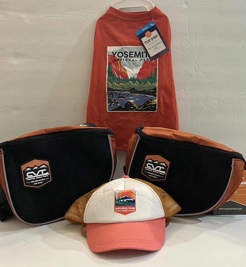 Photo 1 of NEW SMALL DOG ASSORTMENT, 2 BACKPACK/SADDLE BAG, 1 TOP PAW TEE SHIRT, 1 TOP PAW DOG HAT