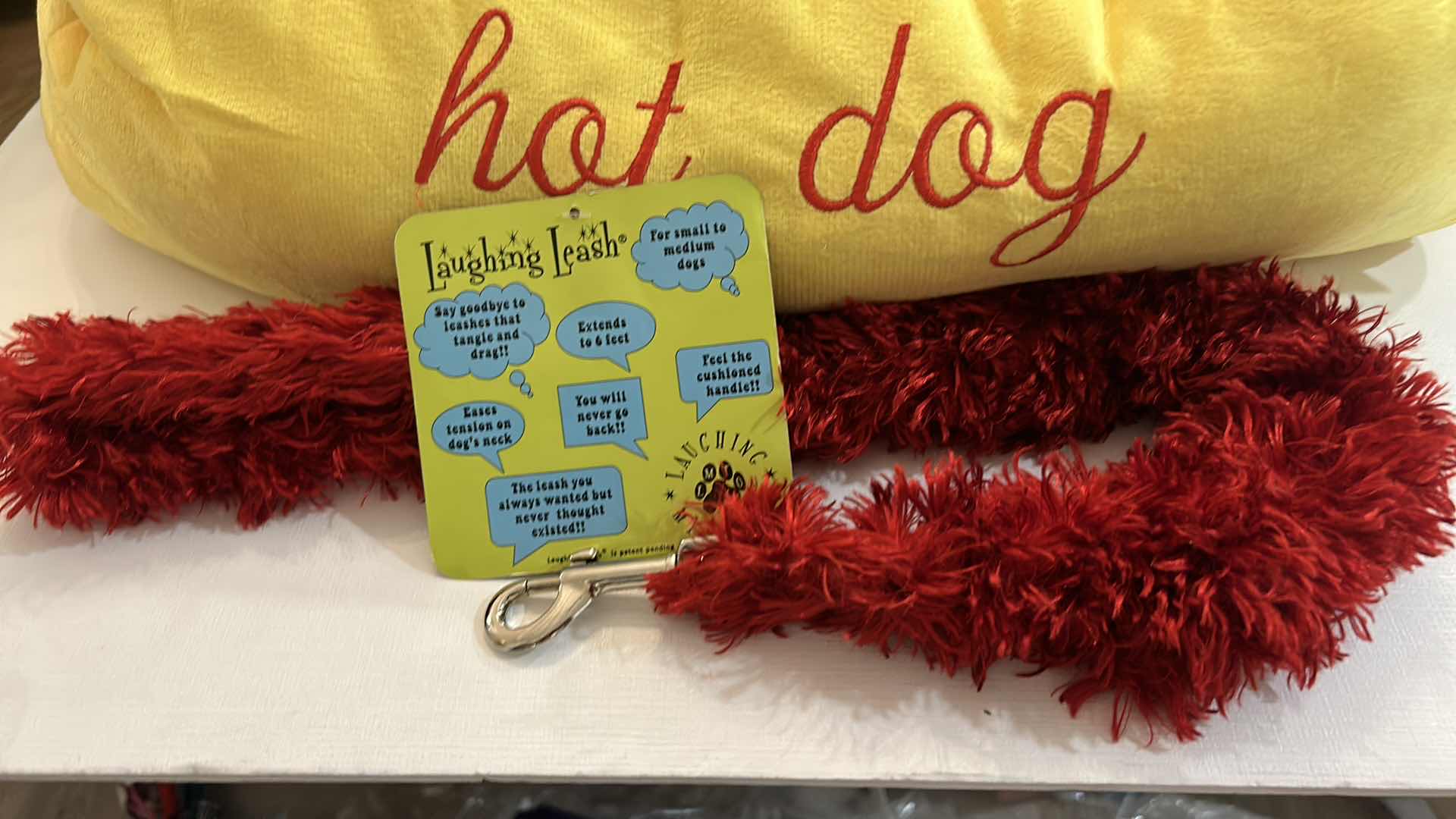 Photo 1 of NEW SMALL DOG ASSORTMENT- ALPHA PAW “HOT DOG BED”, LAUGHING LEASH AND DRESS