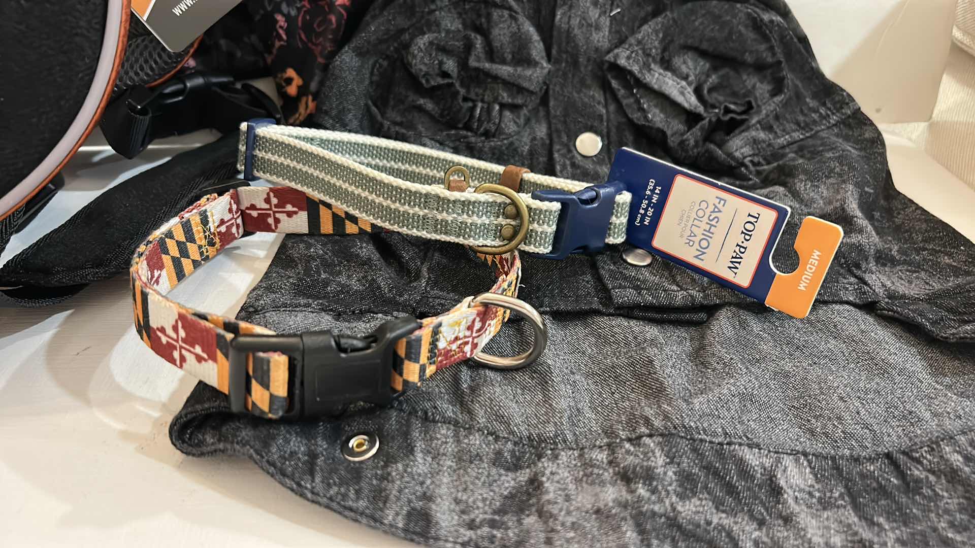 Photo 1 of NEW MEDIUM DOG ASSORTMENT, SADDLEBAG / BACKPACK, DOG DRESS, DEMIM JACKET AND 2 COLLARS