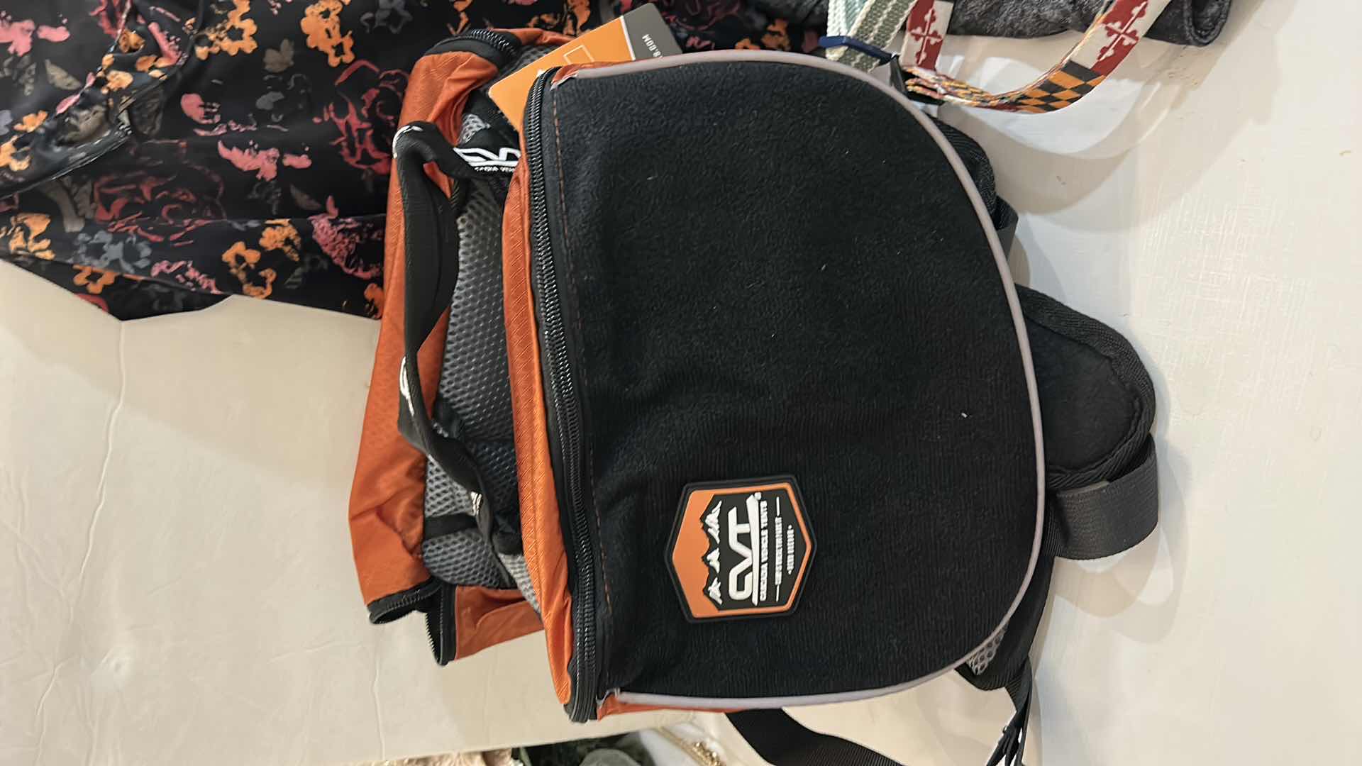 Photo 1 of NEW MEDIUM DOG ASSORTMENT, SADDLEBAG / BACKPACK, DOG DRESS, DEMIM JACKET AND 2 COLLARS