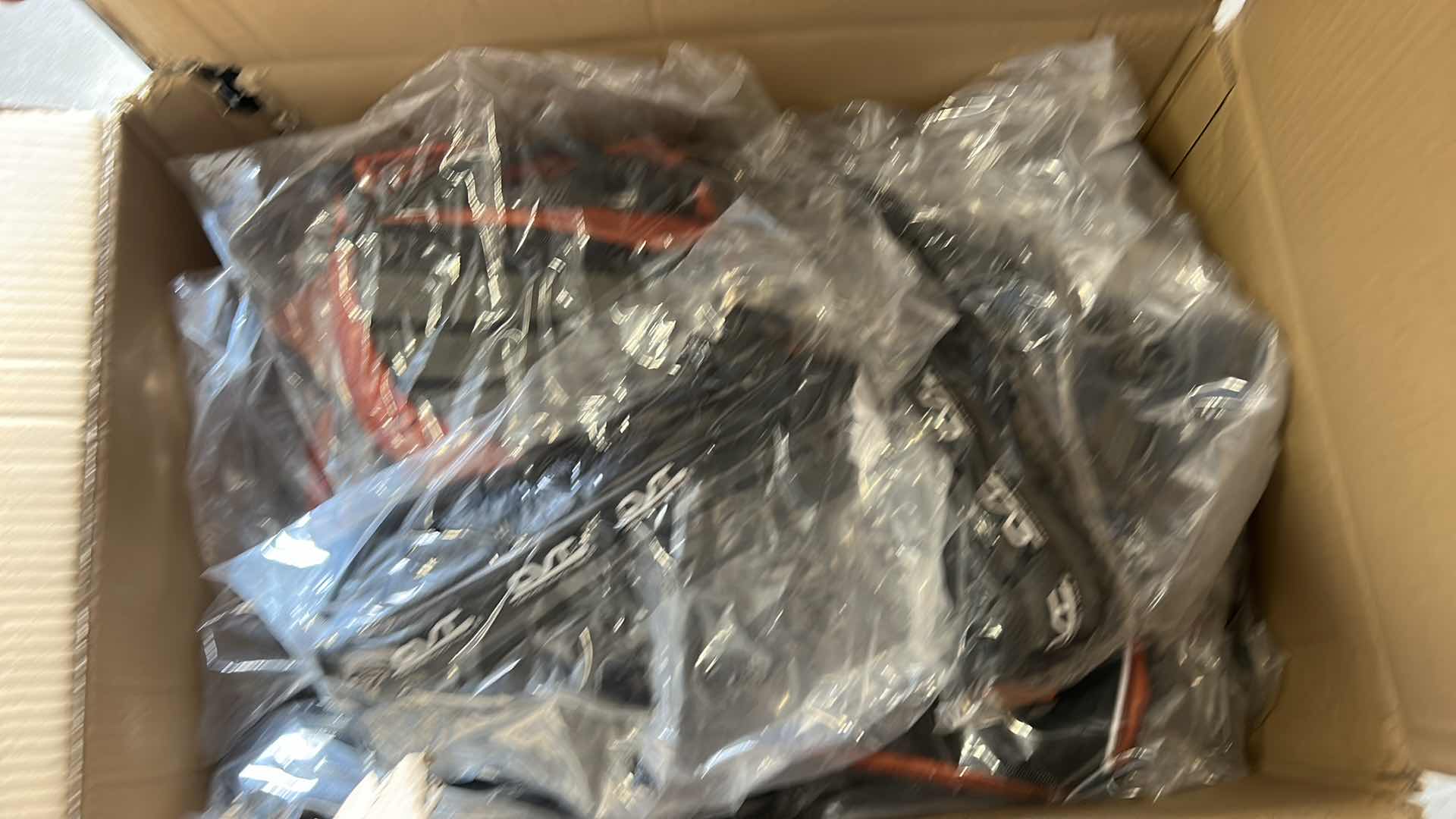 Photo 1 of LARGE BOX OF NEW DOG HARNESSES, SADDLEBAGS AND MORE